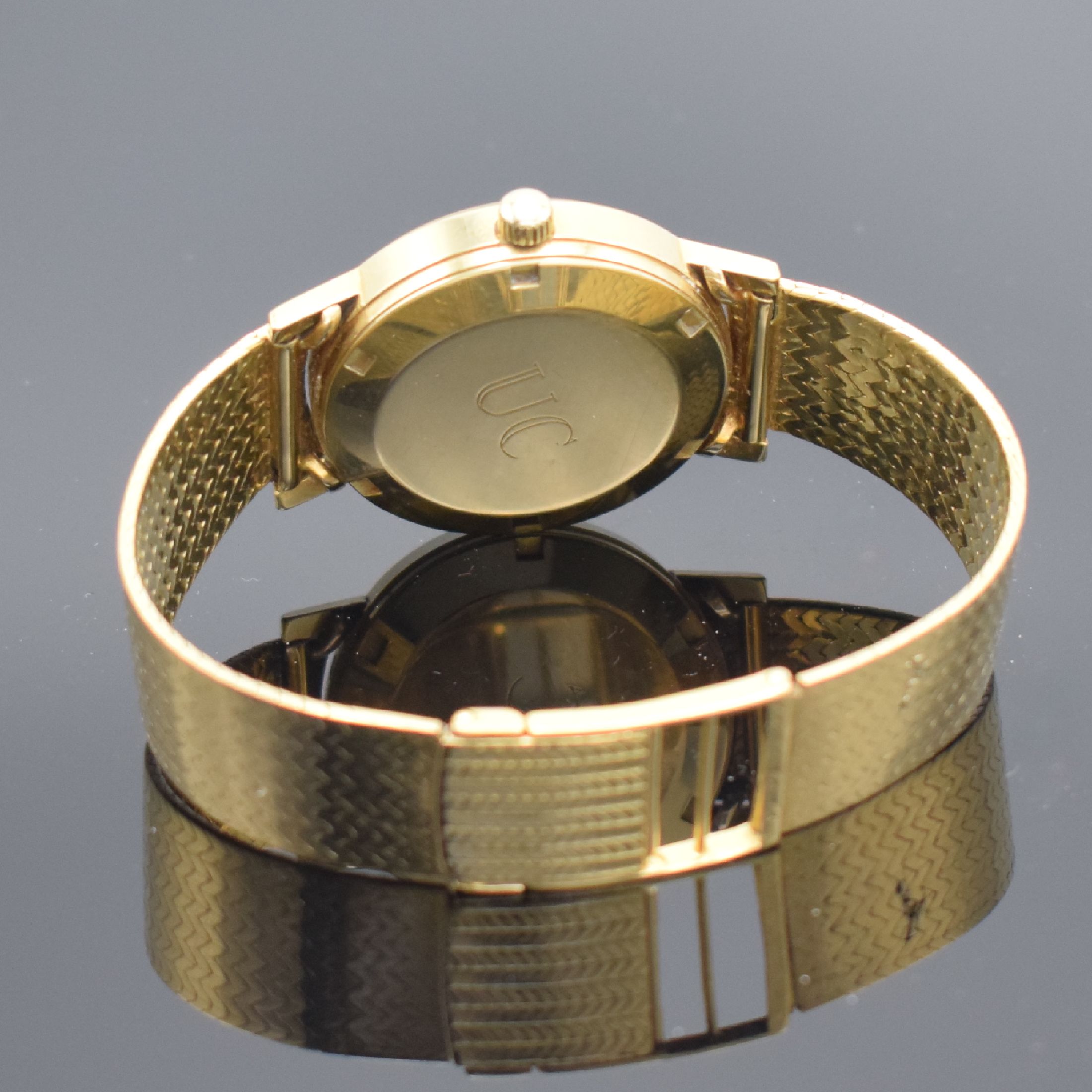 Detail d: OMEGA Herrenarmbanduhr Serie Geneve in GG 750/000 Referenz 166127, Schweiz um 1973, neutr. GG 750/000 Band, verschr. Boden m. Monogramm UC, ...