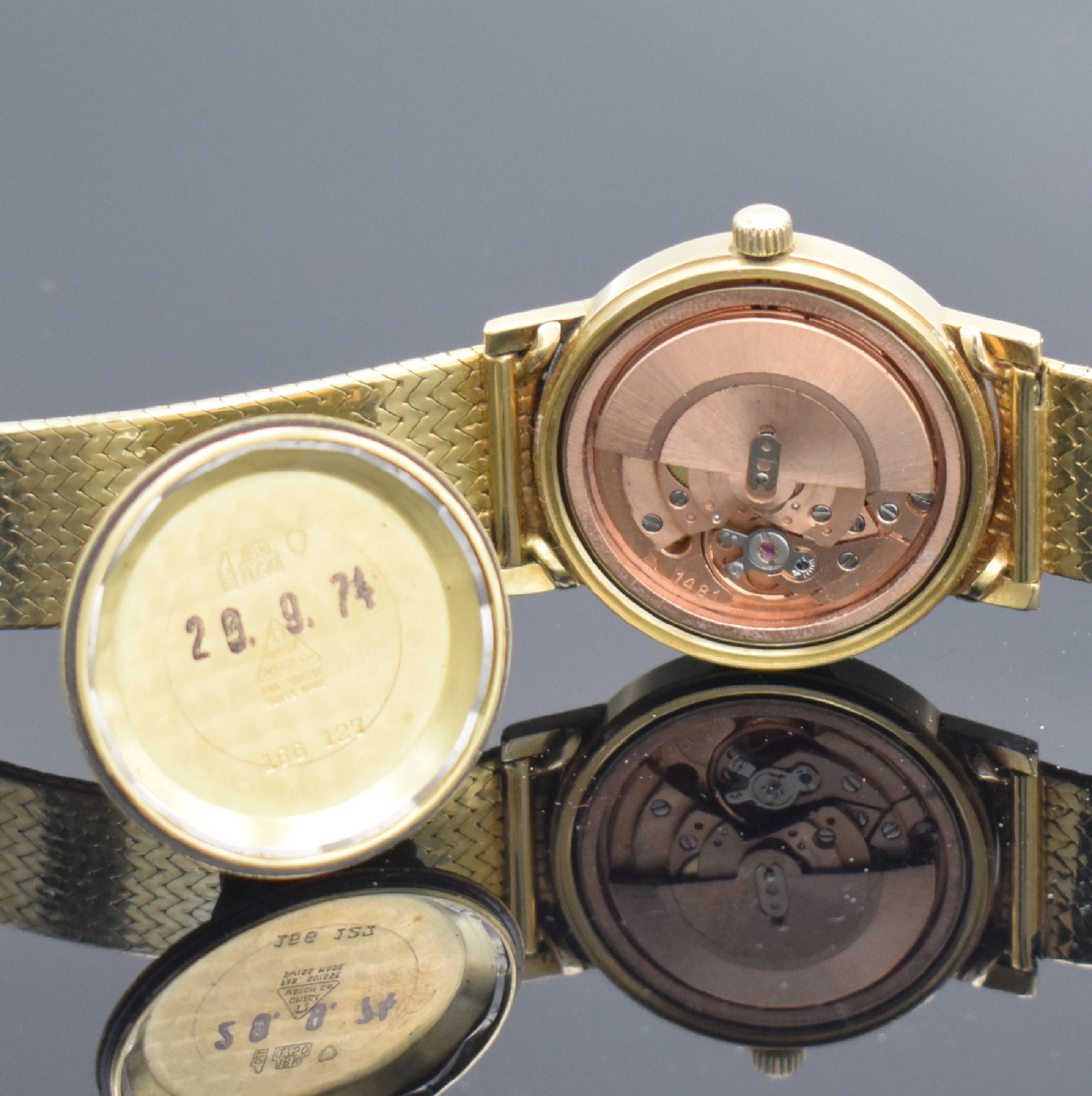 Detail e: OMEGA Herrenarmbanduhr Serie Geneve in GG 750/000 Referenz 166127, Schweiz um 1973, neutr. GG 750/000 Band, verschr. Boden m. Monogramm UC, ...