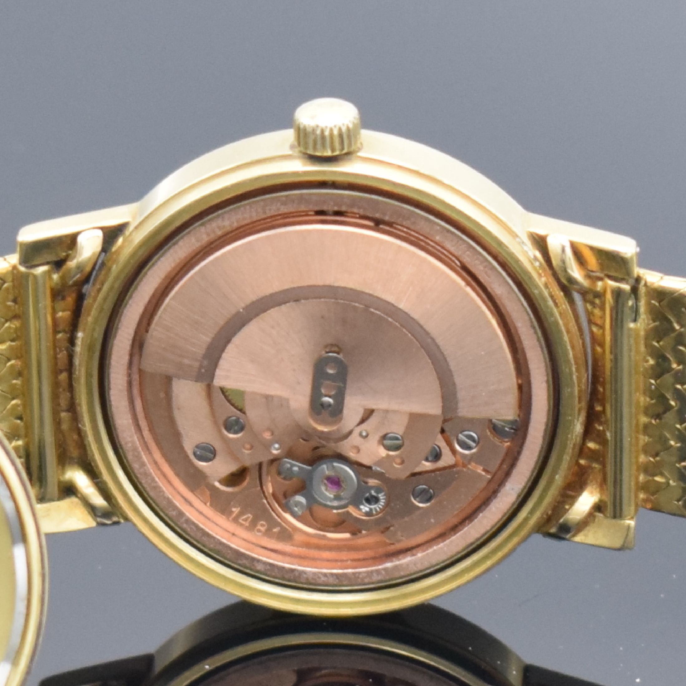 Detail f: OMEGA Herrenarmbanduhr Serie Geneve in GG 750/000 Referenz 166127, Schweiz um 1973, neutr. GG 750/000 Band, verschr. Boden m. Monogramm UC, ...