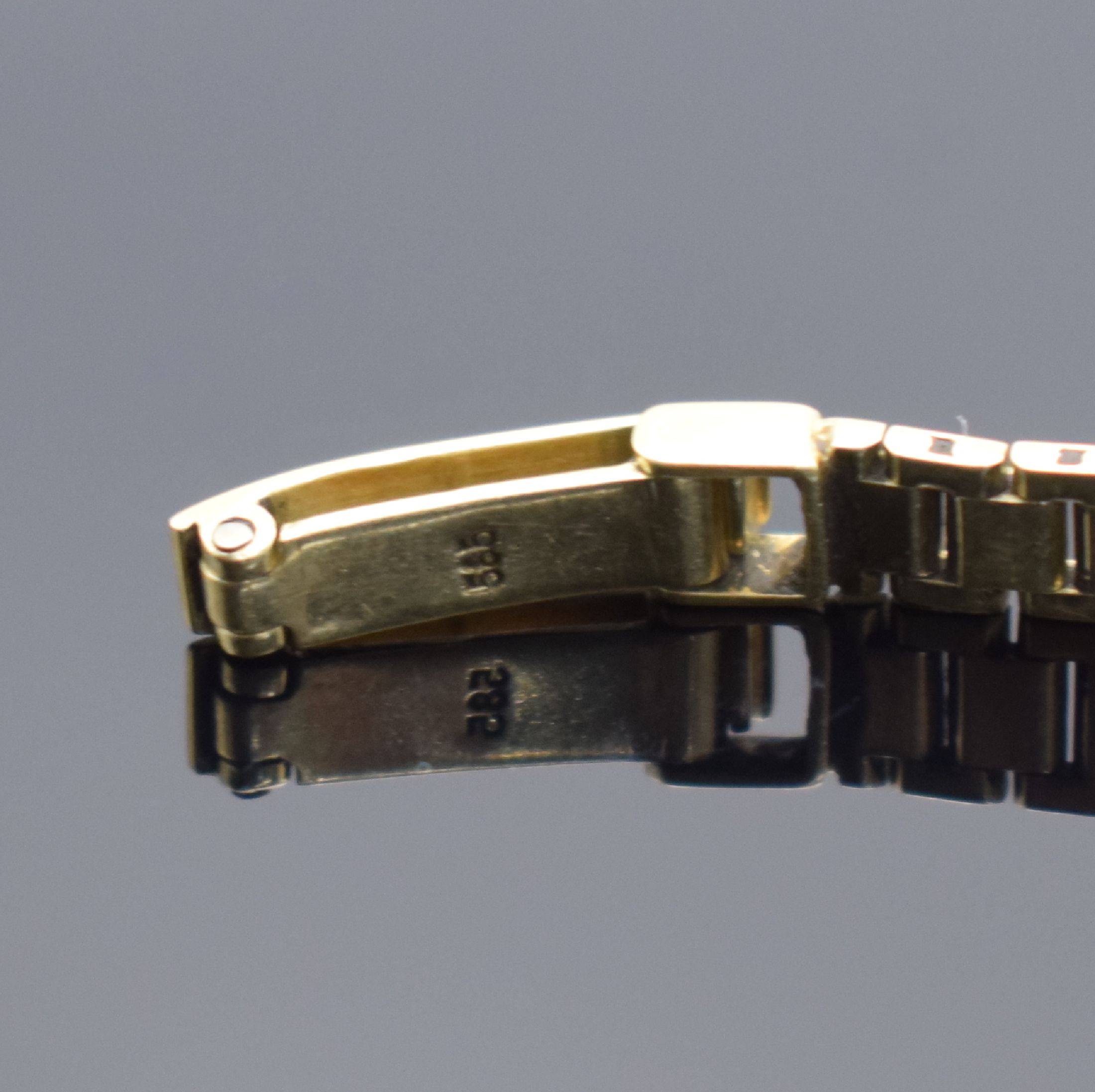 Detail b: ARCTOS Damenarmbanduhr in GG 585/000, Schweiz 1960er Jahre, Handaufzug, Boden aufgedr., an GG 585/000 Armband, silb. Zifferbl. stark pat./fl., gold. ...