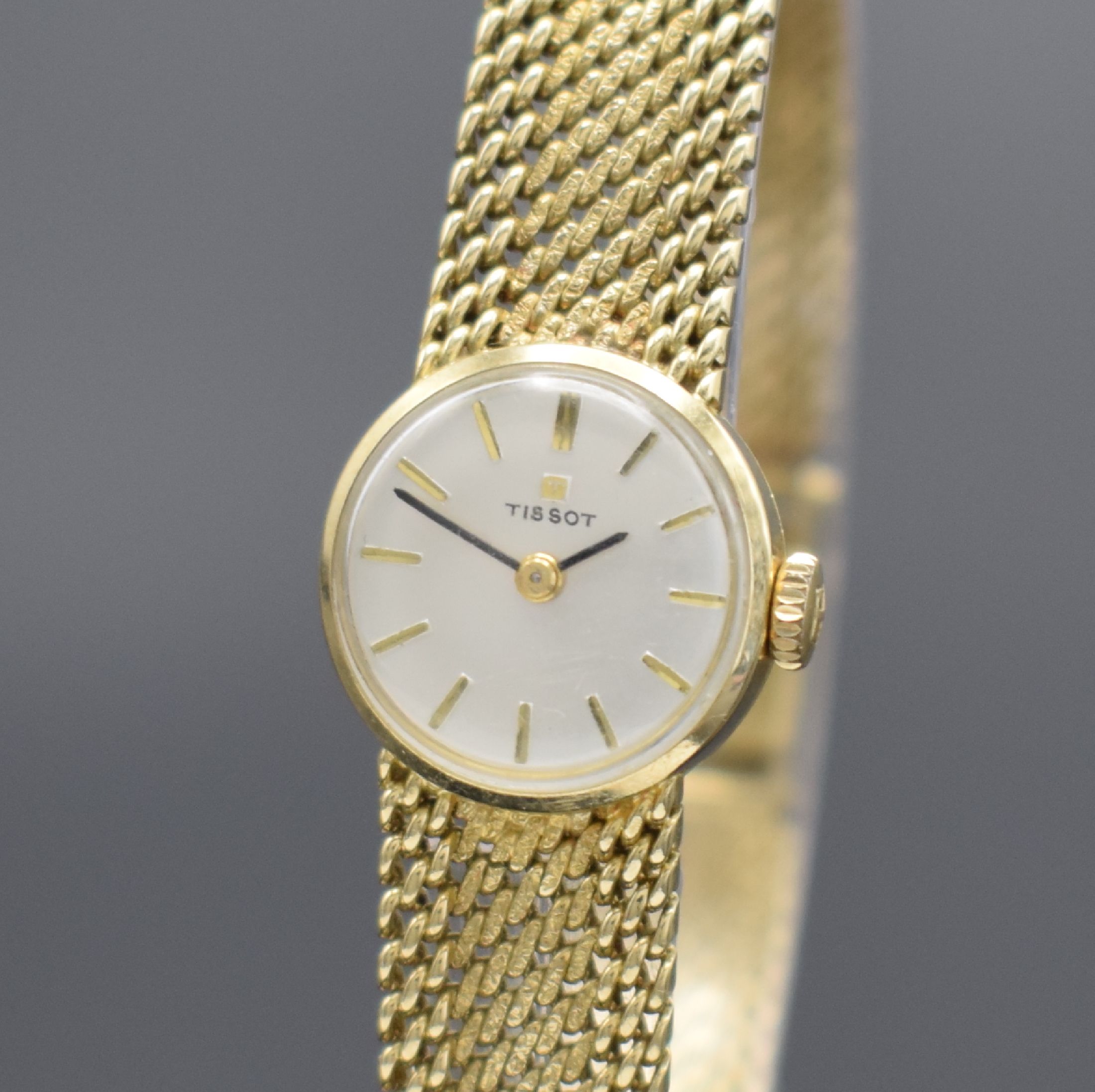 Detail a: TISSOT Damenarmbanduhr in GG 585/000, Schweiz um 1960, Handaufzug, Boden aufgedr., Geh. an GG 585/000 Armband, silb. Zifferbl. m. gold. Std.-Ind., ...
