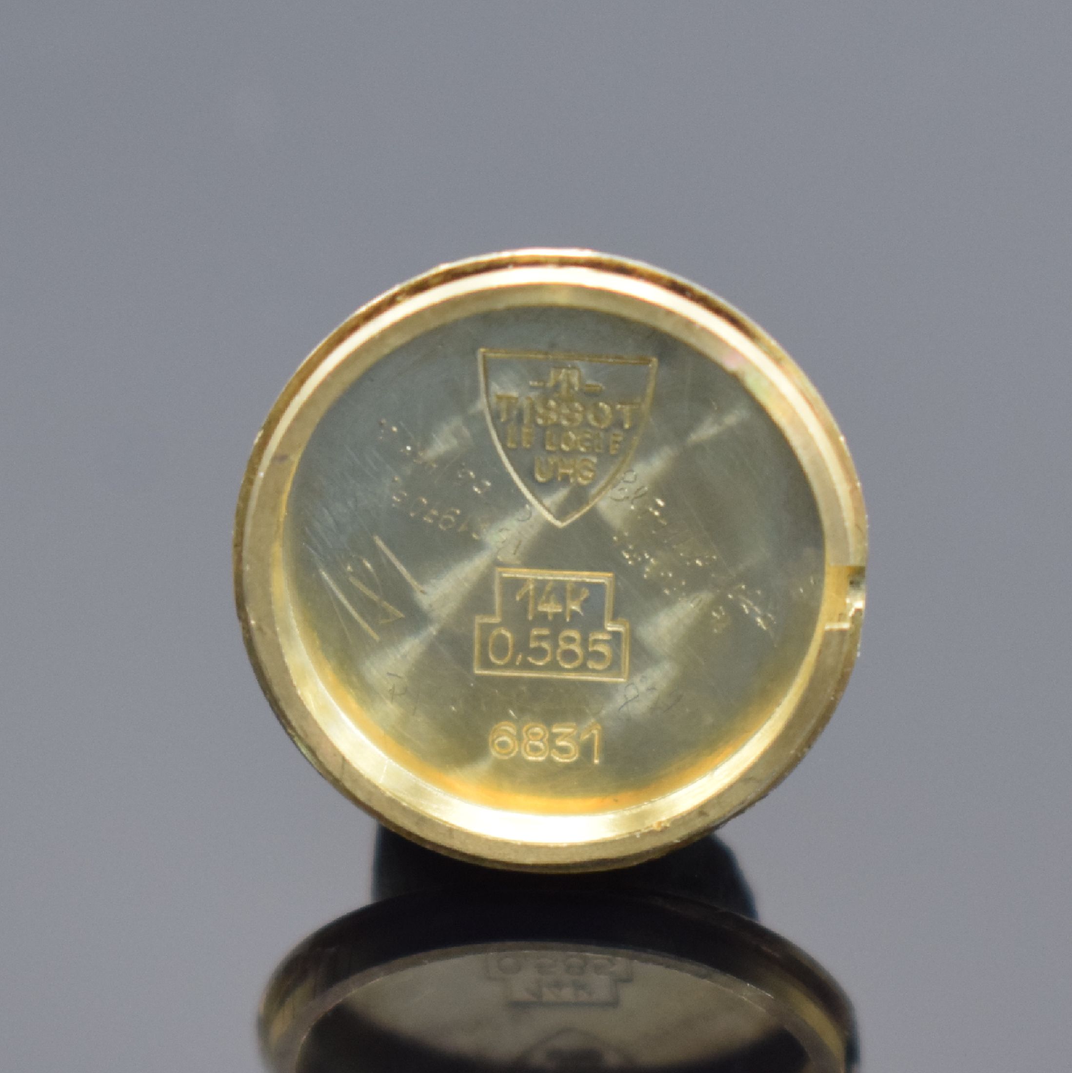 Detail f: TISSOT Damenarmbanduhr in GG 585/000, Schweiz um 1960, Handaufzug, Boden aufgedr., Geh. an GG 585/000 Armband, silb. Zifferbl. m. gold. Std.-Ind., ...