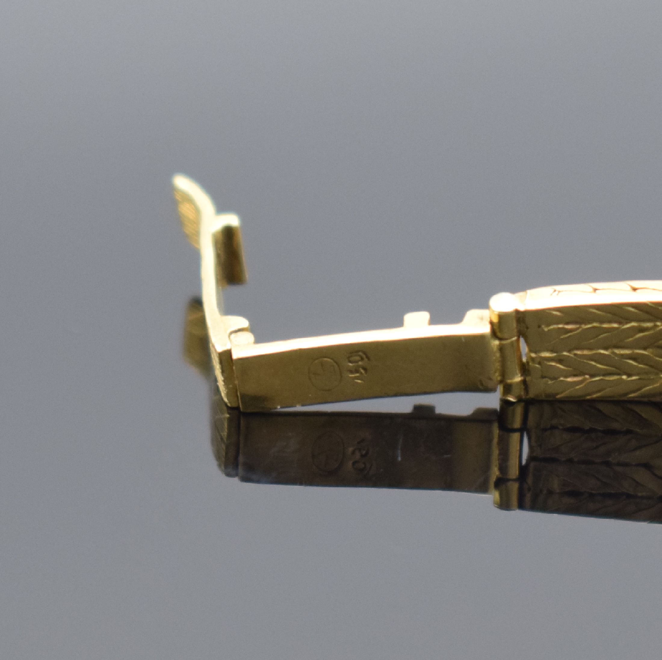 Detail b: GÜBELIN Damenarmbanduhr in GG 750/000, Schweiz 1960er Jahre, Handaufzug, Boden aufgedr., GG 750/000 Armband, silb. Zifferbl. m. gold. Std.-Ind. & ...