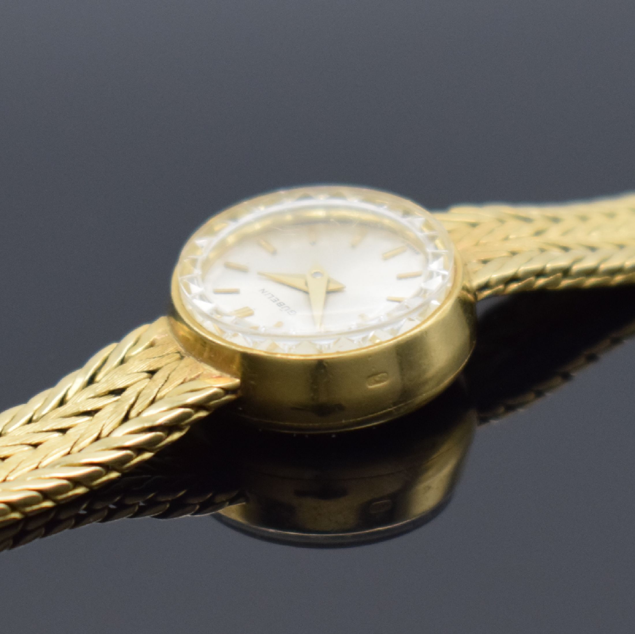 Detail d: GÜBELIN Damenarmbanduhr in GG 750/000, Schweiz 1960er Jahre, Handaufzug, Boden aufgedr., GG 750/000 Armband, silb. Zifferbl. m. gold. Std.-Ind. & ...