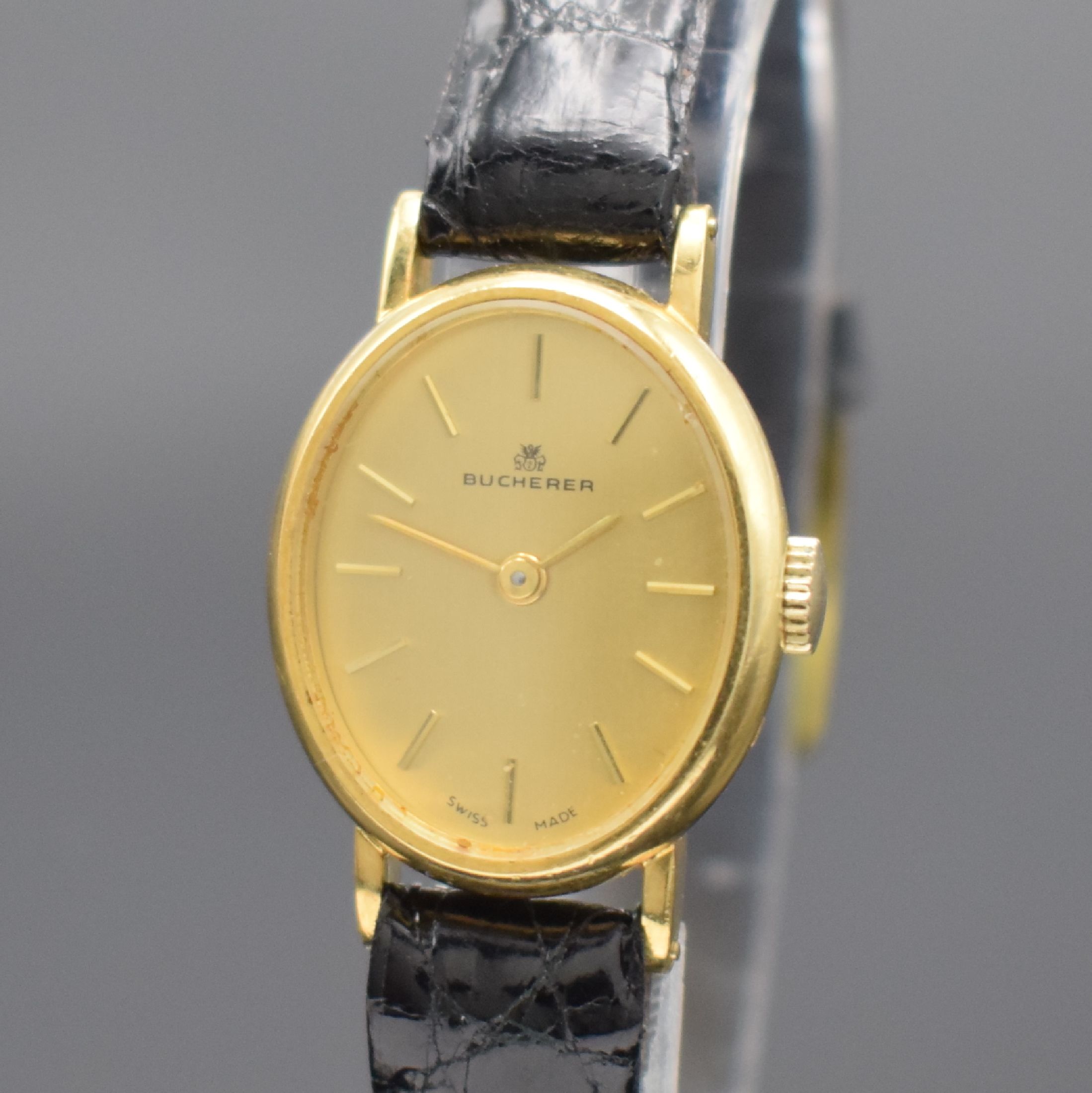 Detail a: BUCHERER Damenarmbanduhr in GG 750/000, Schweiz um 1965, Handaufzug, Boden aufgedr., gold. Zifferbl. m. gold. Std.-Ind. & Zeigern, Kal. ETA 2412, 17 ...