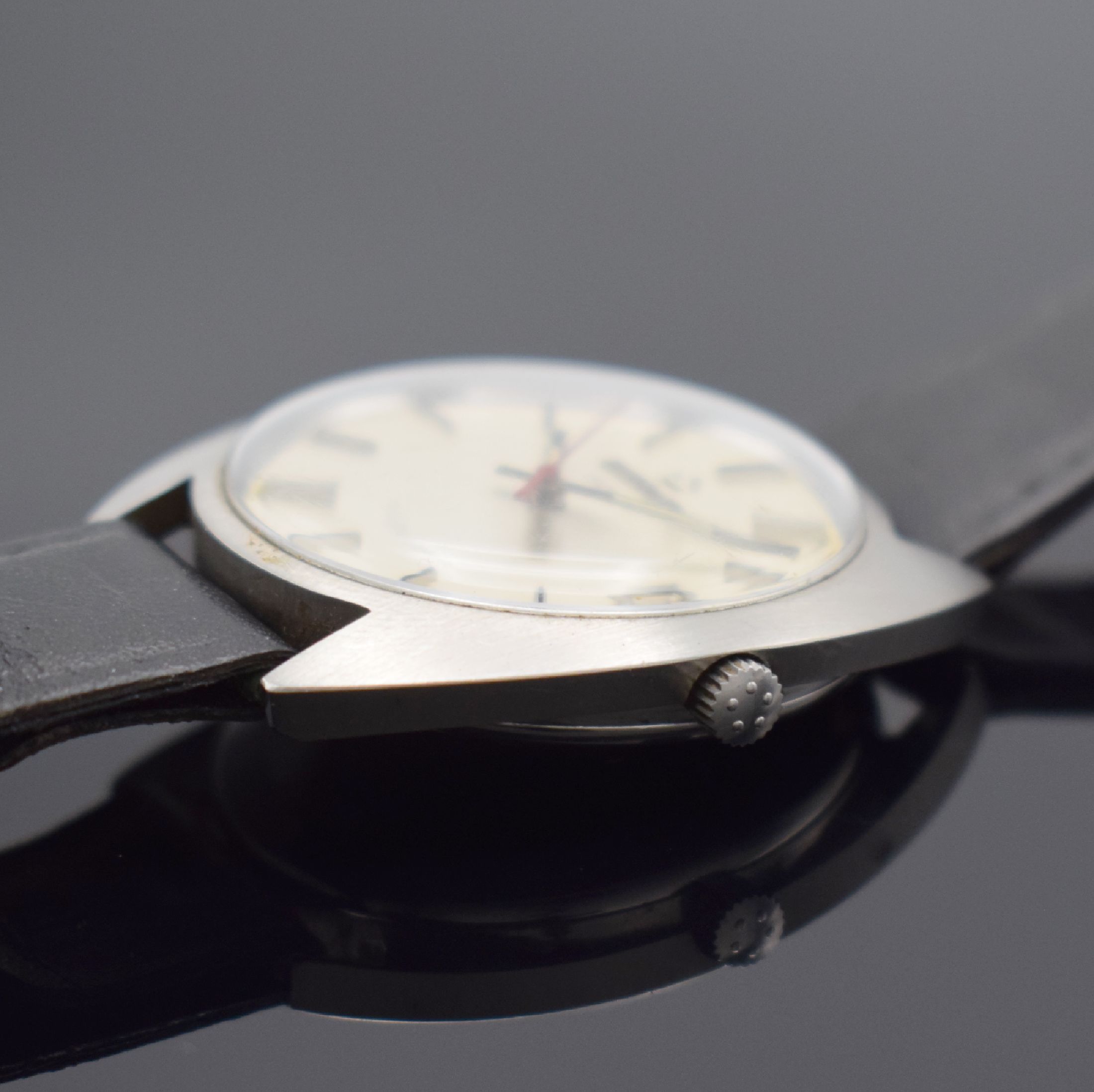 Detail b: ETERNA Sonic Herrenarmbanduhr in Stahl Referenz 149T, Schweiz um 1970, satin. Geh., Boden aufgedr., silb. Zifferbl. m. aufgel. Std.-Ind., silb. ...