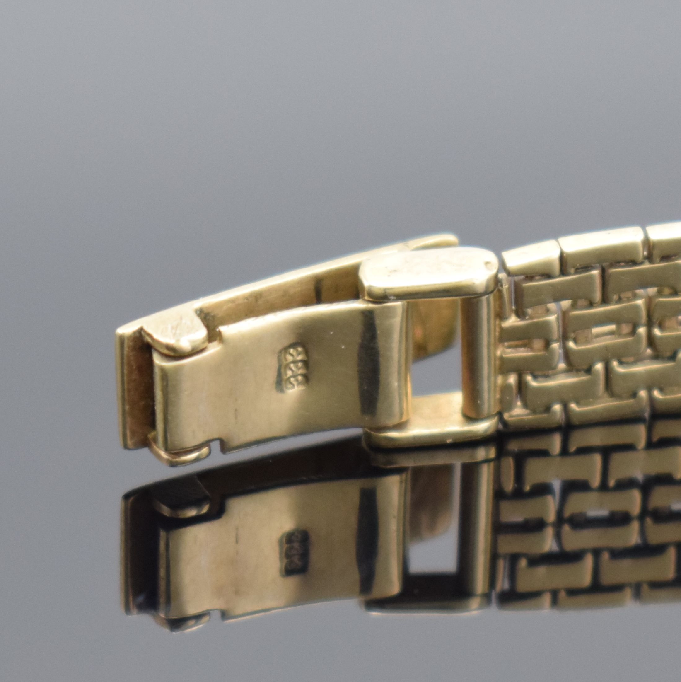 Detail b: FORMATIC Damenarmbanduhr in GG 585/000, Schweiz 1960er Jahre, Handaufzug, Geh. an Goldband in GG 333/000, Boden aufgedr., champagnerfarb. Zifferbl. ...