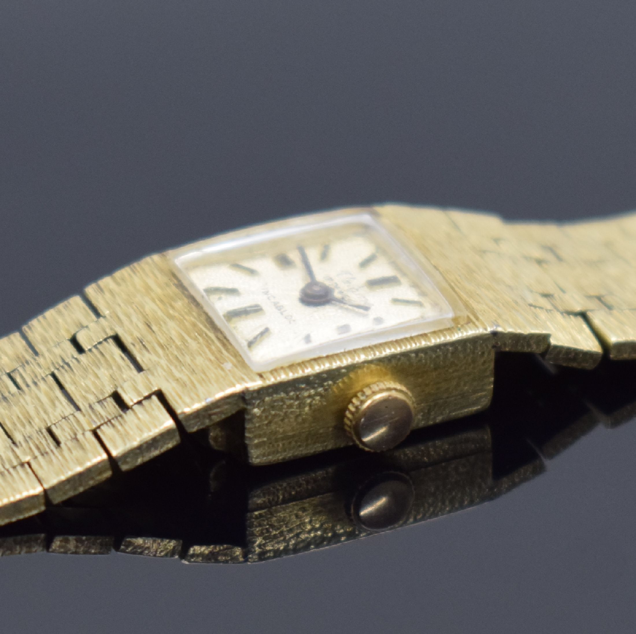 Detail c: VALGINE Damenarmbanduhr in GG 585/000, Schweiz 1960er Jahre, Handaufzug, Geh. an Goldband in GG 585/000, Boden aufgedr., silb. Strukturzifferbl. m. ...