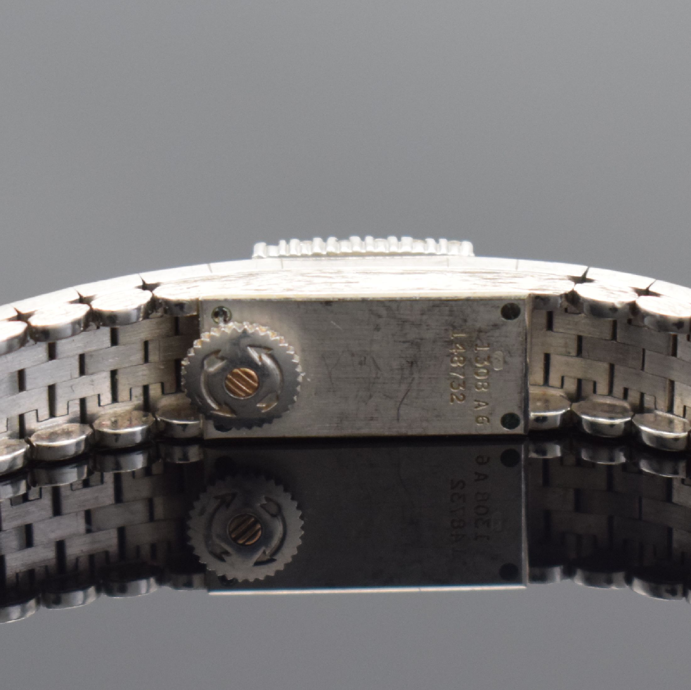 Detail d: PIAGET Damenarmbanduhr in WG 750/000 mit Diamantbesatz, Schweiz um 1960, Handaufzug, Ref. 1308 A6, inkl. Goldband in WG 750/000, Lünette aufw. m. ...