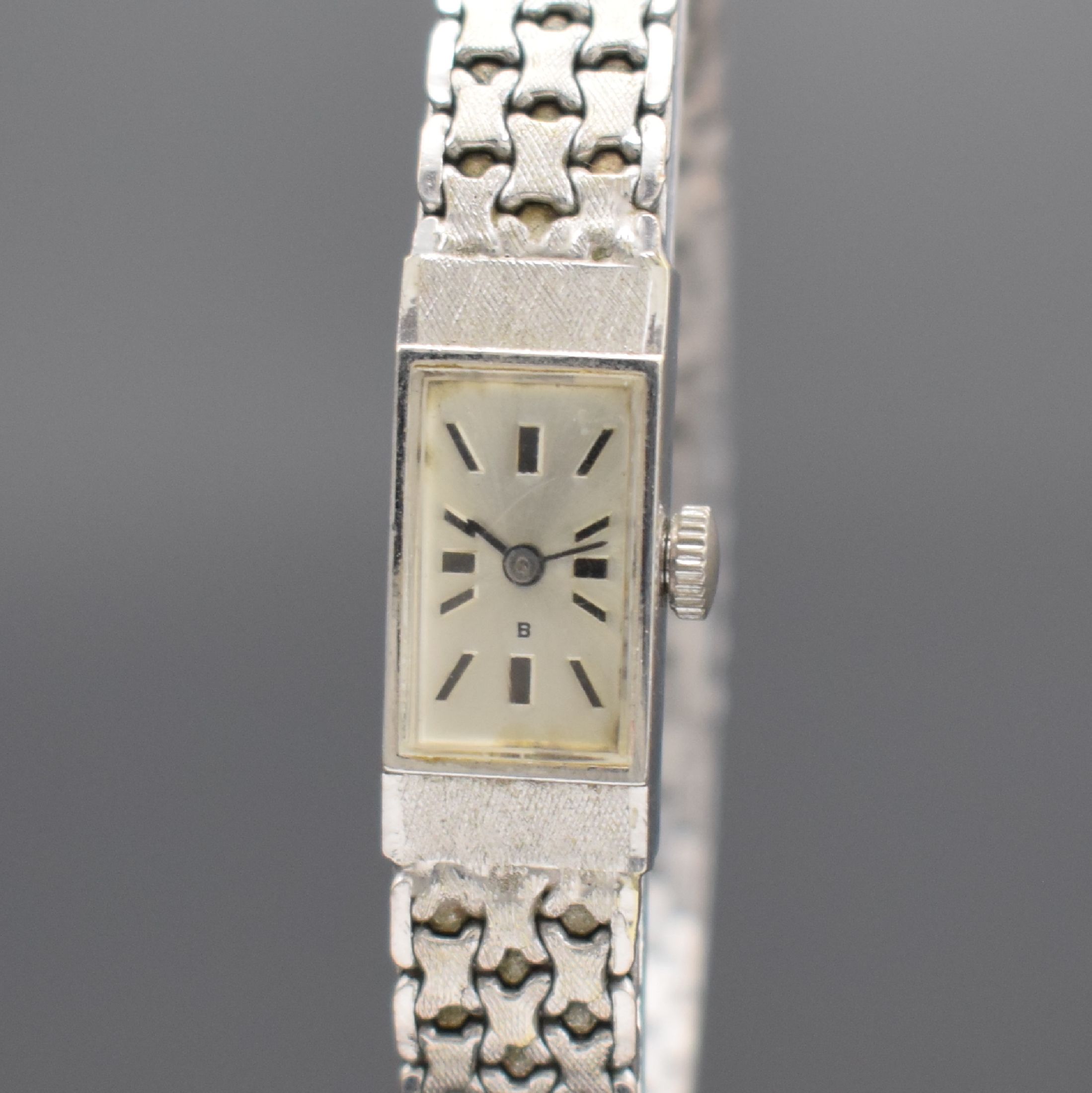 Detail a: Damenarmbanduhr in WG 585/000, Schweiz 1960er Jahre, Handaufzug, Geh. an Goldband in WG 585/000, Boden aufgedr., silb. Zifferbl. m. aufgel. Std.-Ind. ...