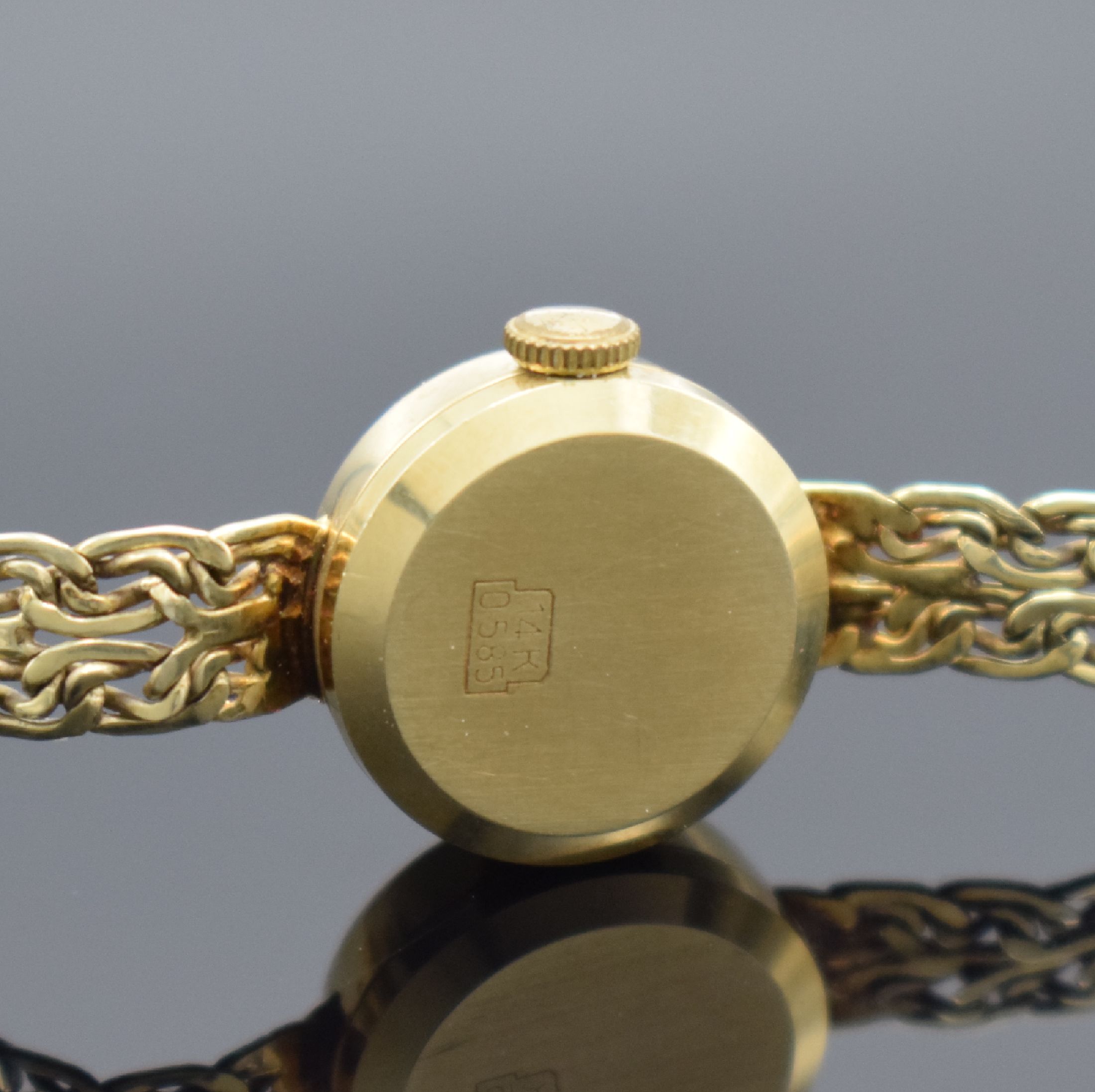 Detail c: KRÖNER Damengoldbanduhr in GG 585/000, Schweiz 1960er Jahre, Handaufzug, Geh. an Goldband in GG 585/000, Boden aufgedr., goldfarb. Zifferbl. m. ...