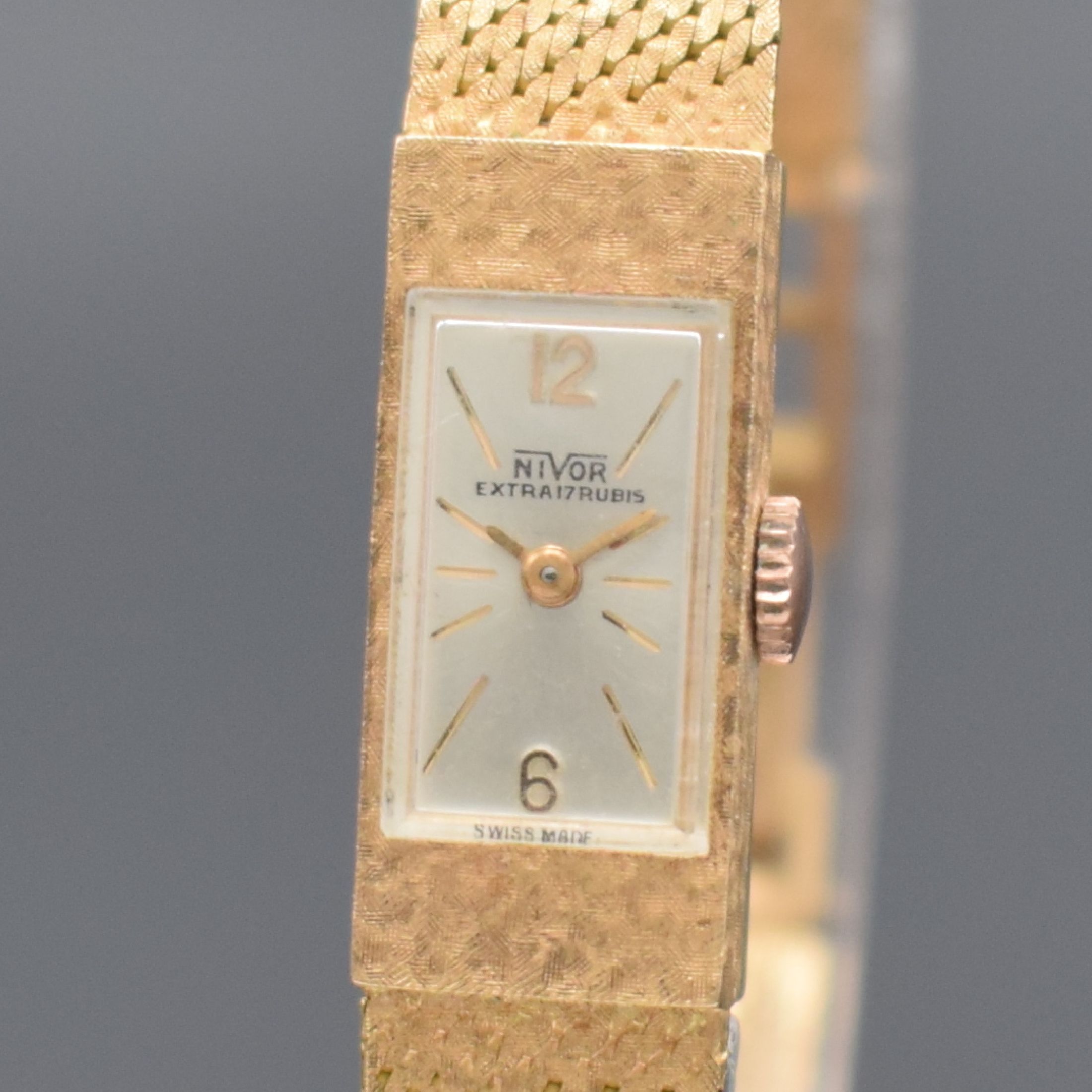Detail a: NIVOR Damenarmbanduhr in RoséG 750/000, Schweiz 1960er Jahre, Handaufzug, Geh. an Goldband in RoséG 750/000, Boden aufgedr., silb. Zifferbl. m. ...