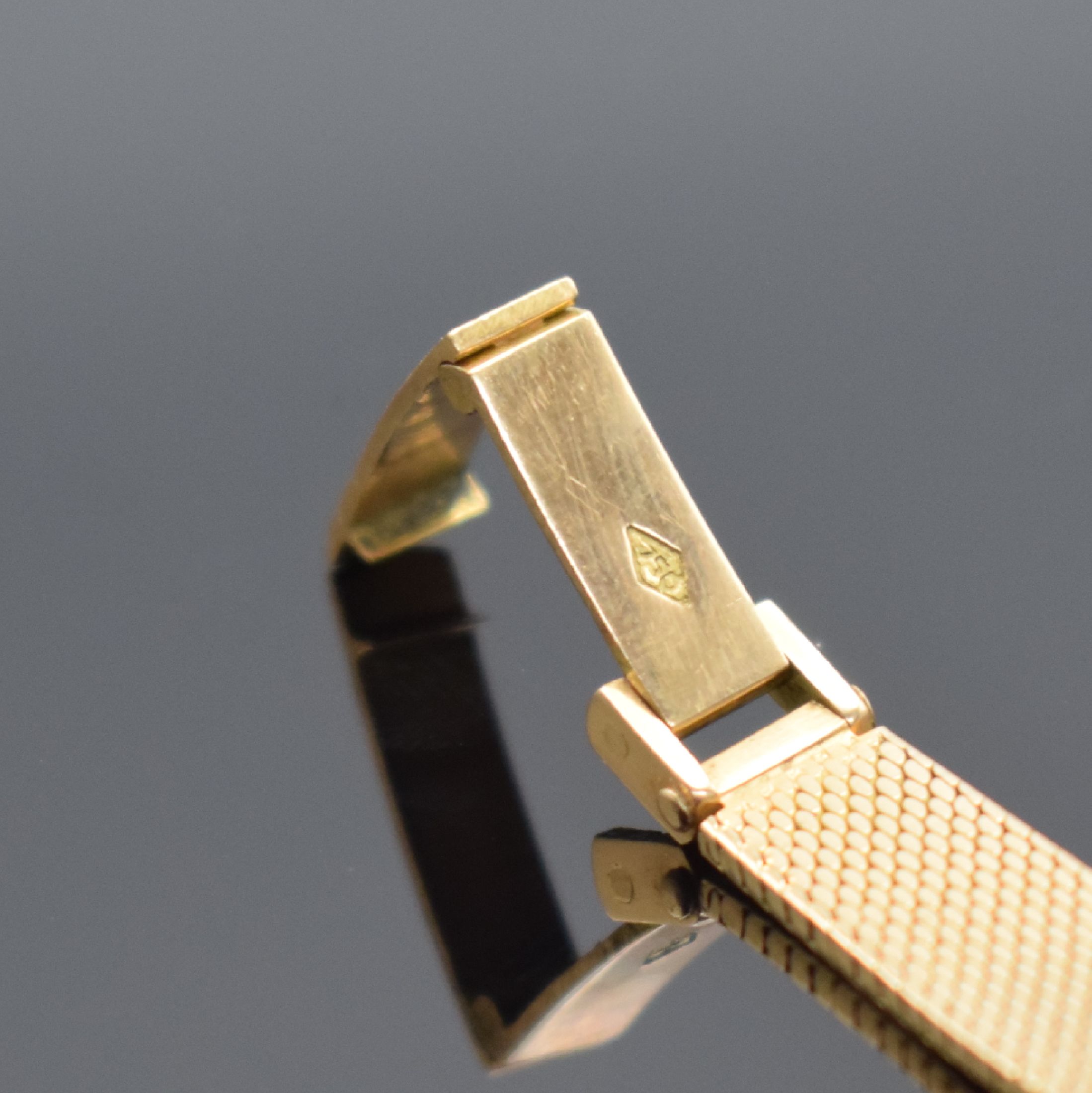 Detail c: NIVOR Damenarmbanduhr in RoséG 750/000, Schweiz 1960er Jahre, Handaufzug, Geh. an Goldband in RoséG 750/000, Boden aufgedr., silb. Zifferbl. m. ...