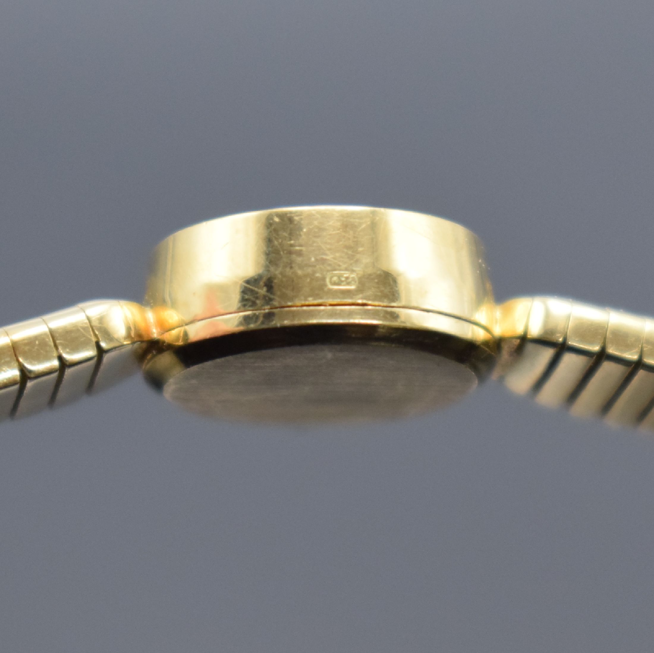 Detail c: GG 750/0000 Damenarmbanduhr, Schweiz 1960er Jahre, Handaufzug, GG 750/000 Armband, Boden aufgedr., silb. Zifferbl. m. gold. Std.-Ind. & Zeiger, Werk ...