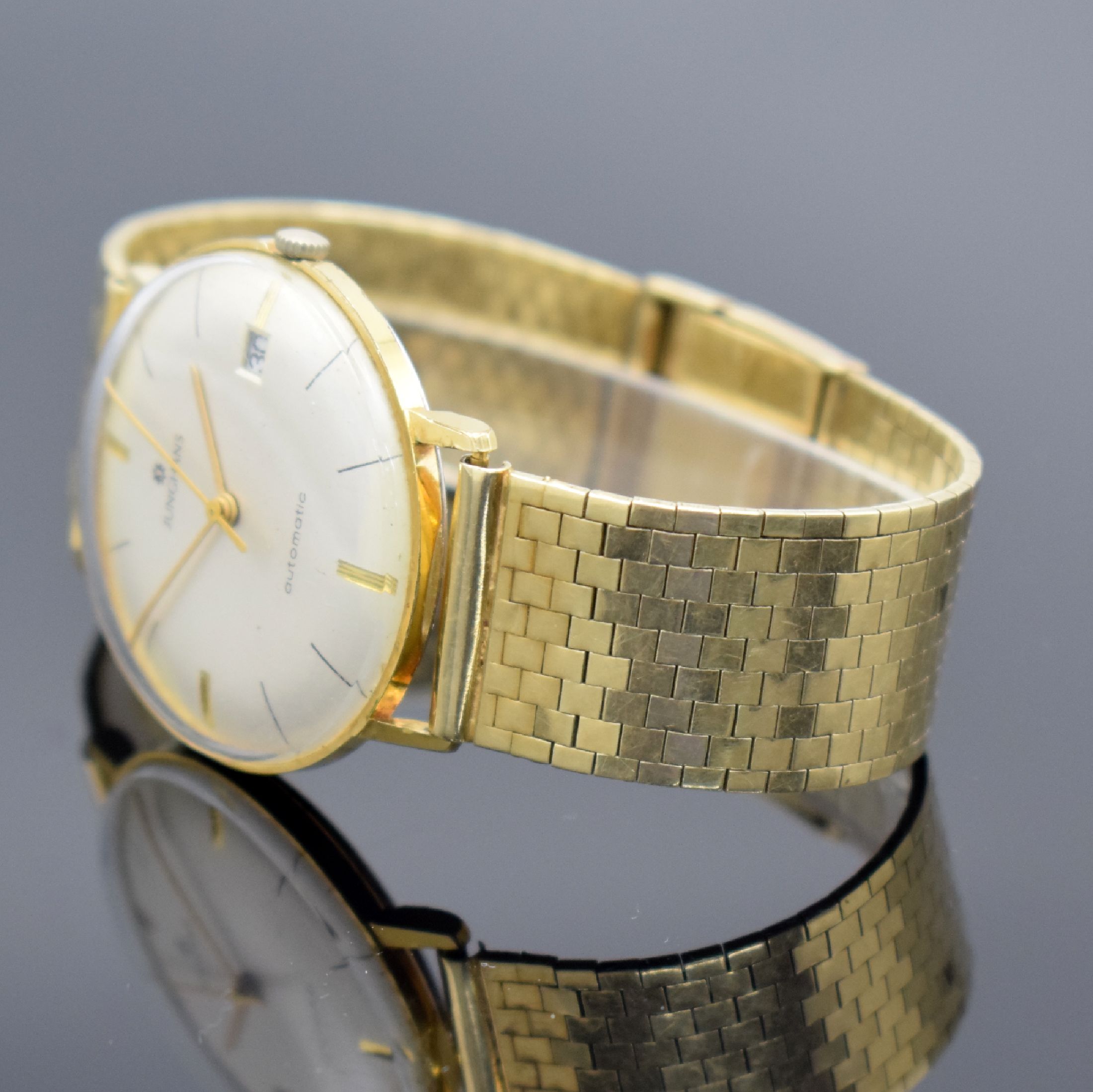 Detail a: JUNGHANS vergoldete Armbanduhr mit Band in GG 585/000, Schweiz um 1960, Automatik, Goldband später, Stahlboden aufgedr., gold. Zeiger, Datum, Kal. ...