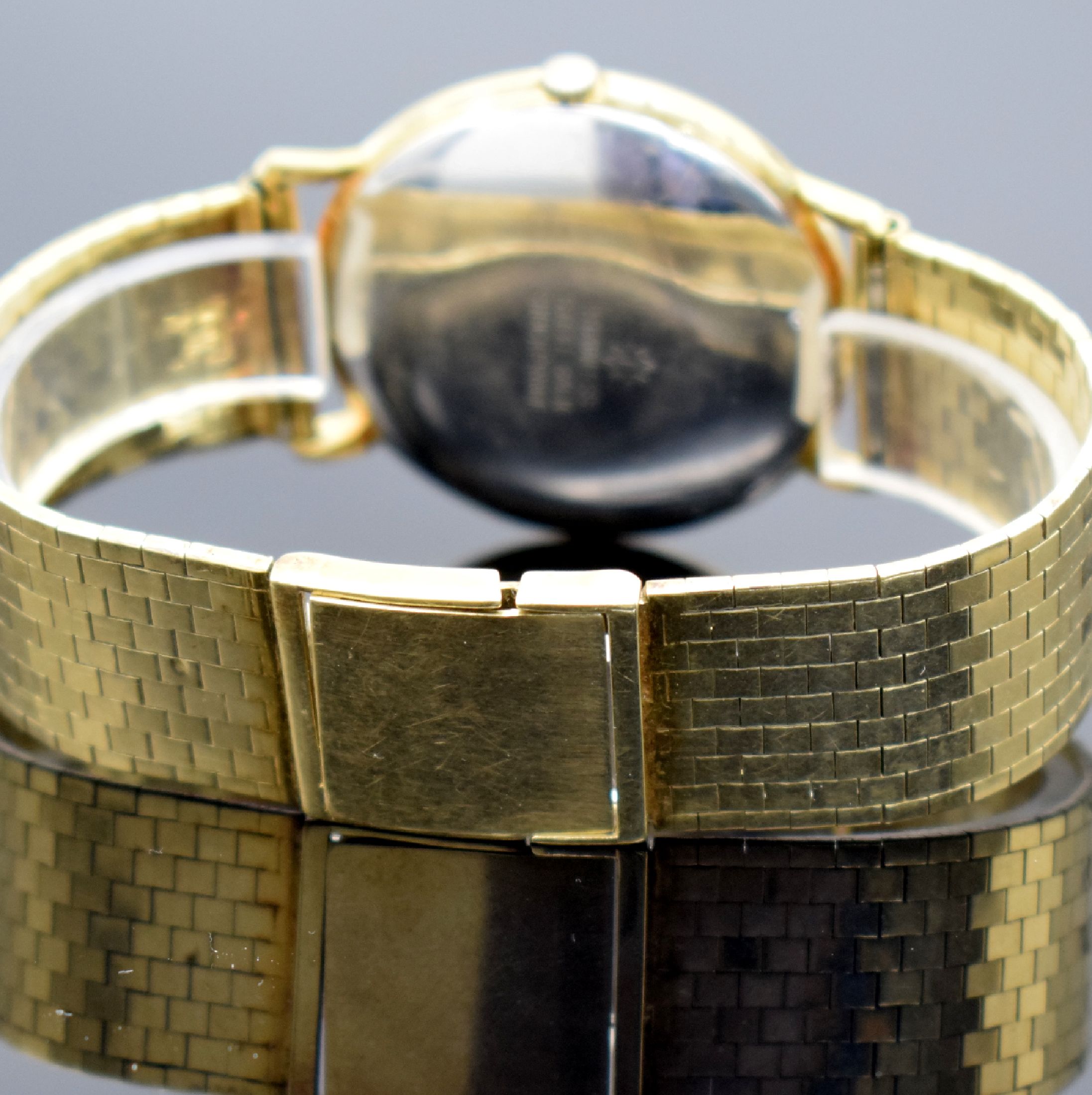 Detail b: JUNGHANS vergoldete Armbanduhr mit Band in GG 585/000, Schweiz um 1960, Automatik, Goldband später, Stahlboden aufgedr., gold. Zeiger, Datum, Kal. ...