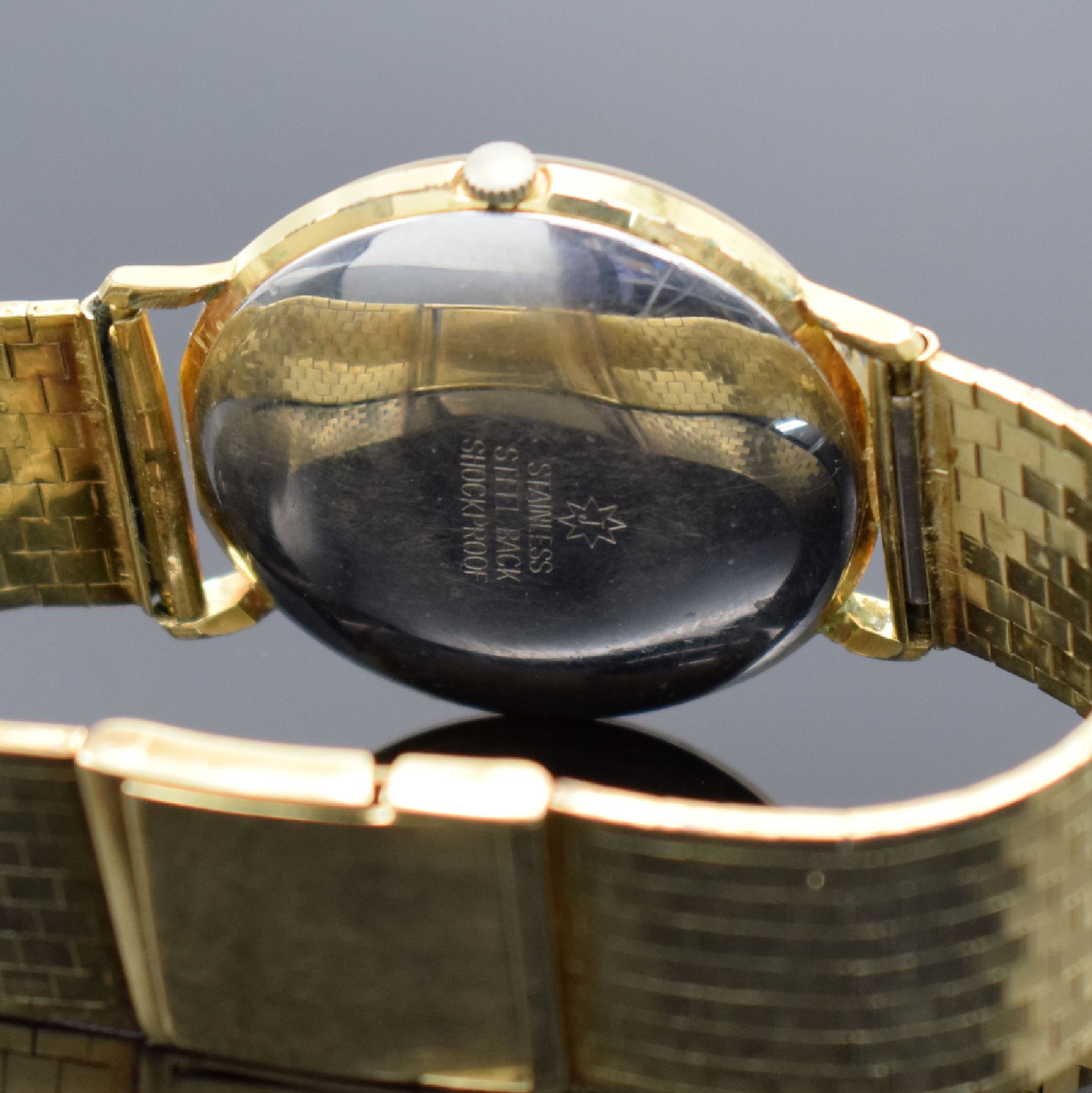 Detail c: JUNGHANS vergoldete Armbanduhr mit Band in GG 585/000, Schweiz um 1960, Automatik, Goldband später, Stahlboden aufgedr., gold. Zeiger, Datum, Kal. ...