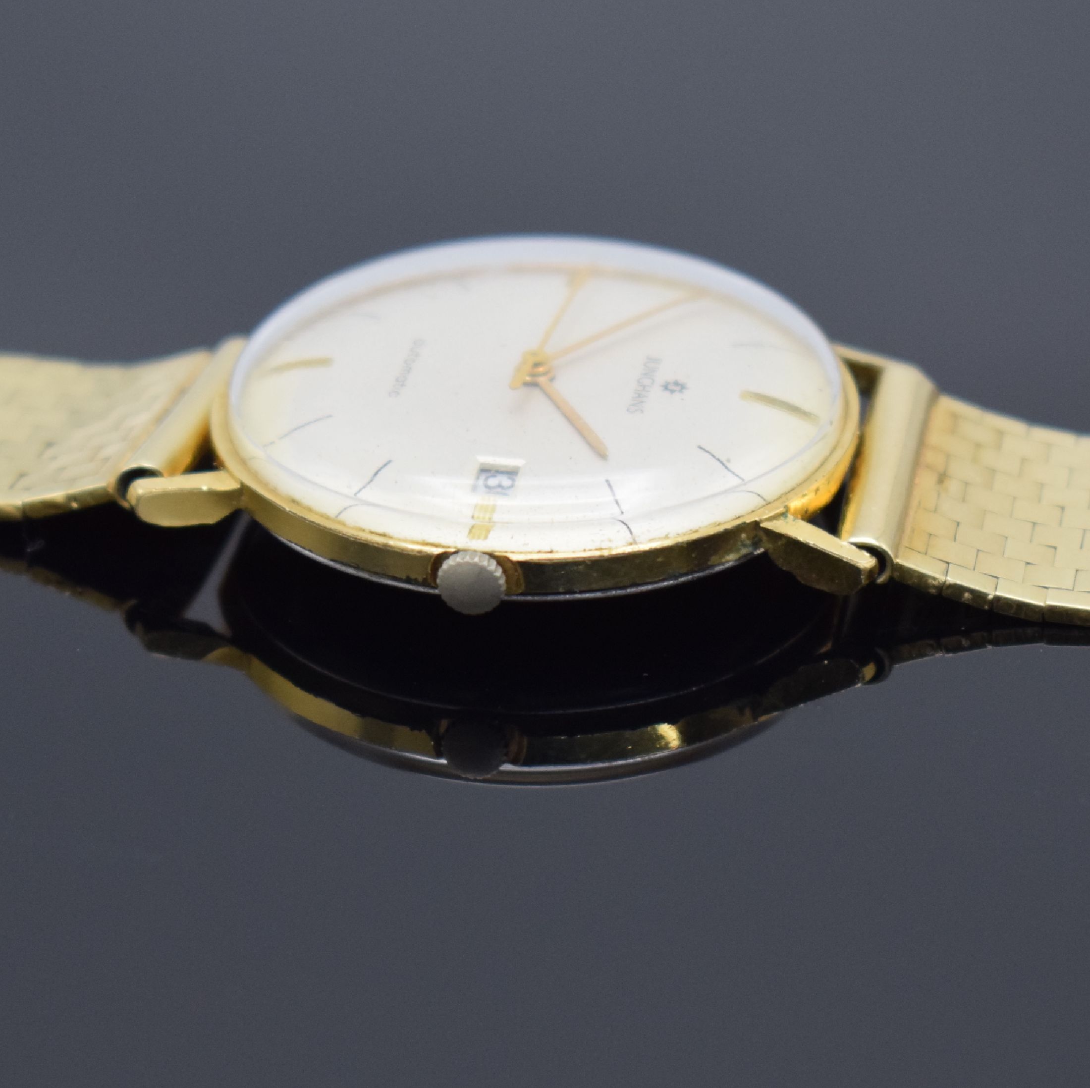 Detail d: JUNGHANS vergoldete Armbanduhr mit Band in GG 585/000, Schweiz um 1960, Automatik, Goldband später, Stahlboden aufgedr., gold. Zeiger, Datum, Kal. ...