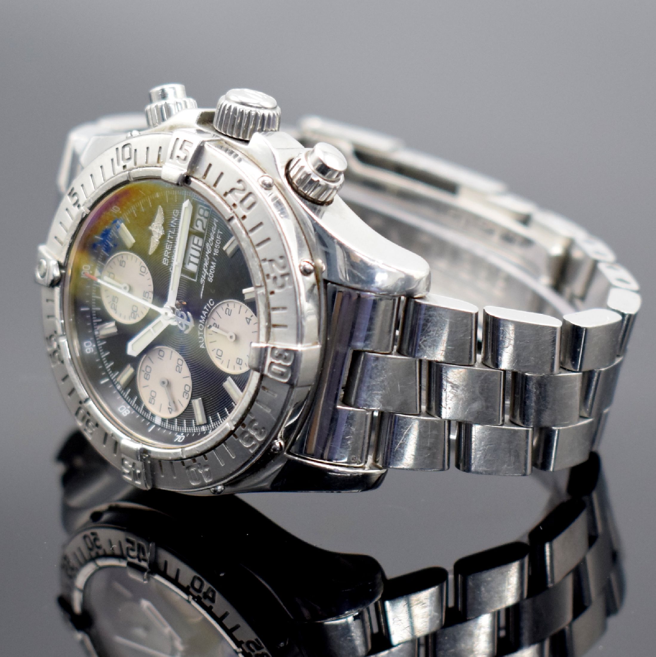 Detail b: BREITLING Super Ocean Herrenarmbanduhr mit Chronograph, Schweiz verk. 12/2009 lt. beil. Zert., Ref. A13340, verschr. Edelstahl Geh. inkl. Gliederband ...