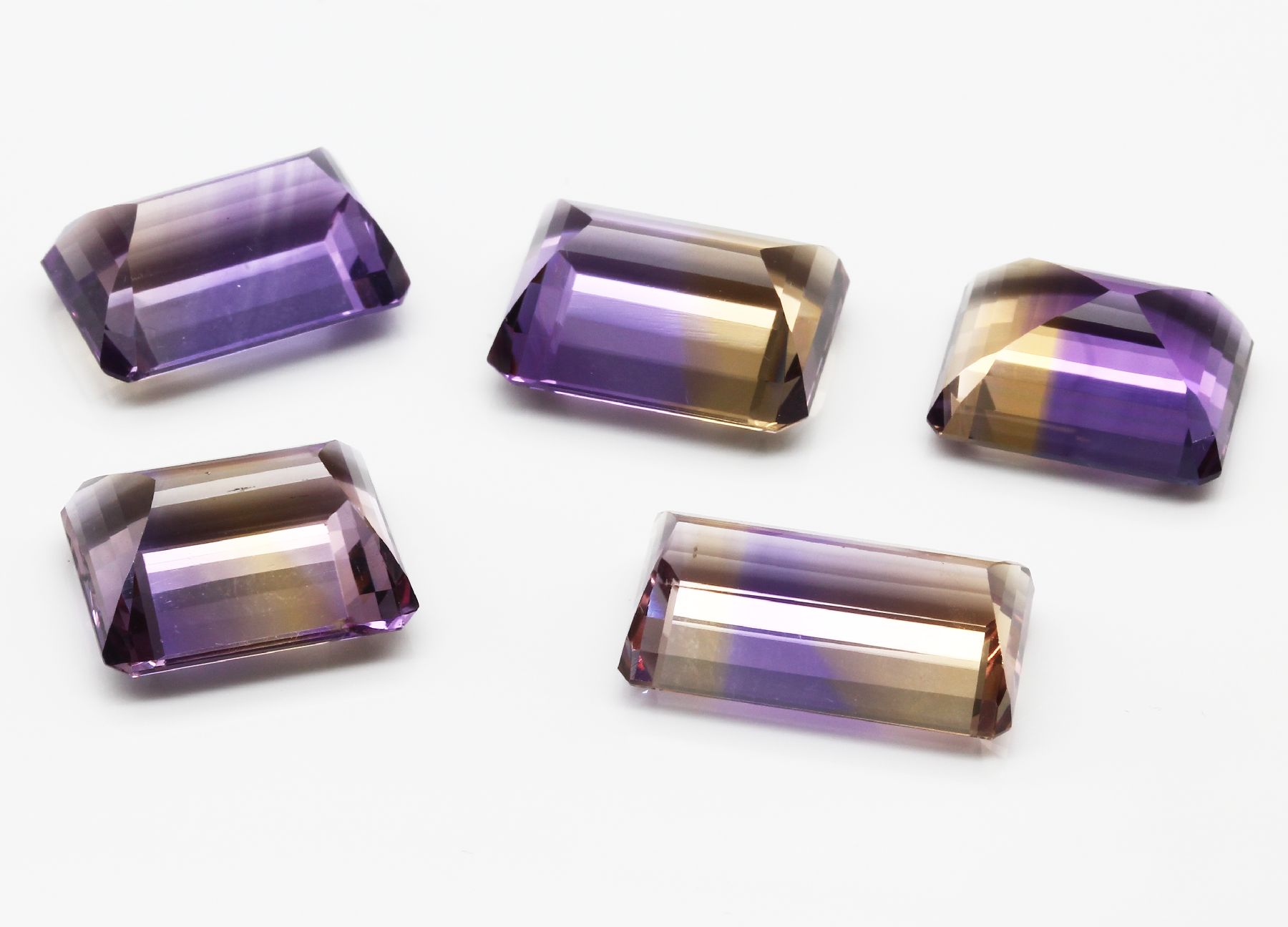 Detail a: Lot 5 lose Ametrine zus. ca. 91,00 ct , Idar-Obersteiner Schleifarbeit, Treppenschliff in versch. Größen