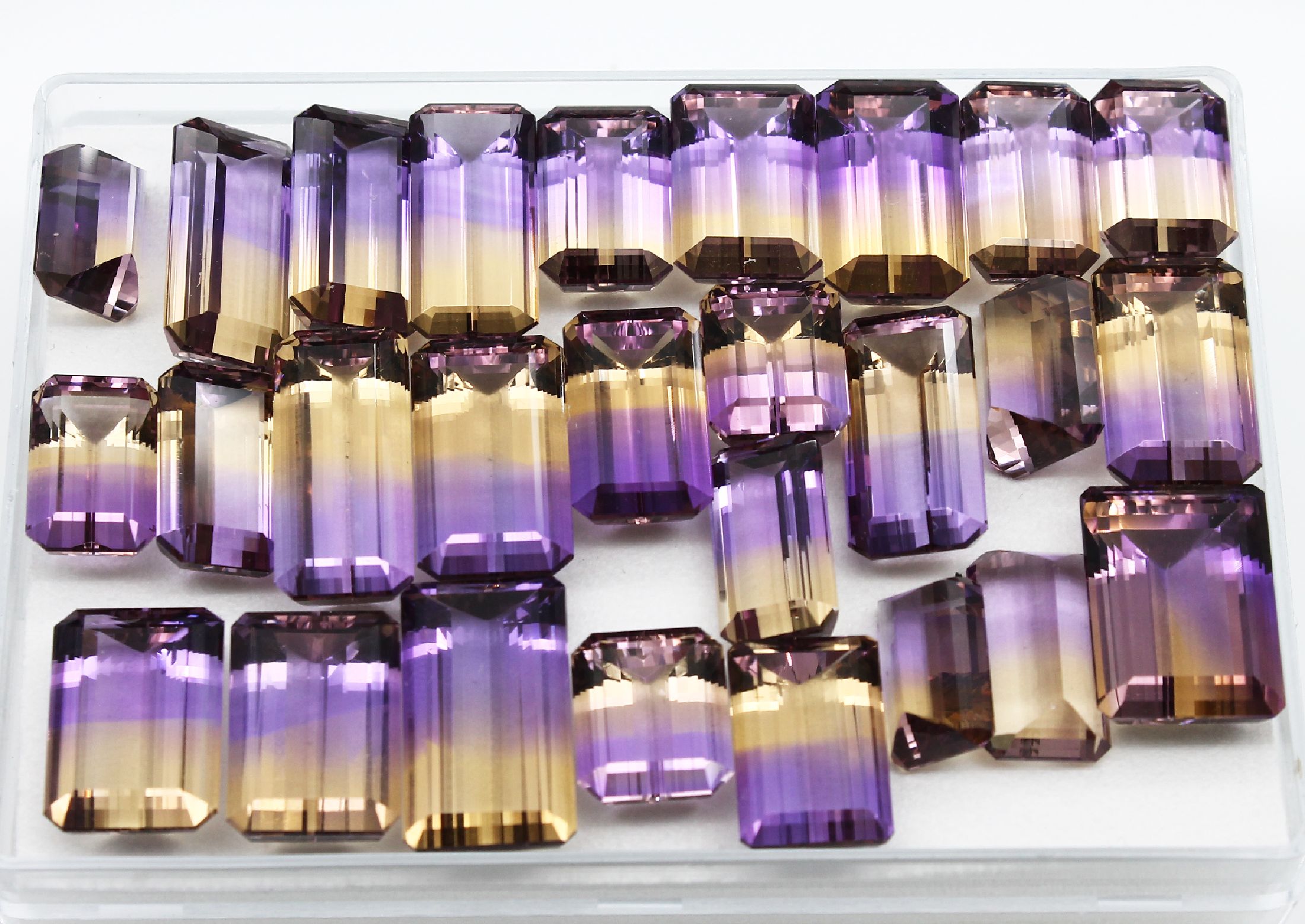 Detail a: Lot 27 lose Ametrine, ca. 200.00 ct, Idar-Obersteiner Schleifarbeit, Treppenschliff in versch. Größen