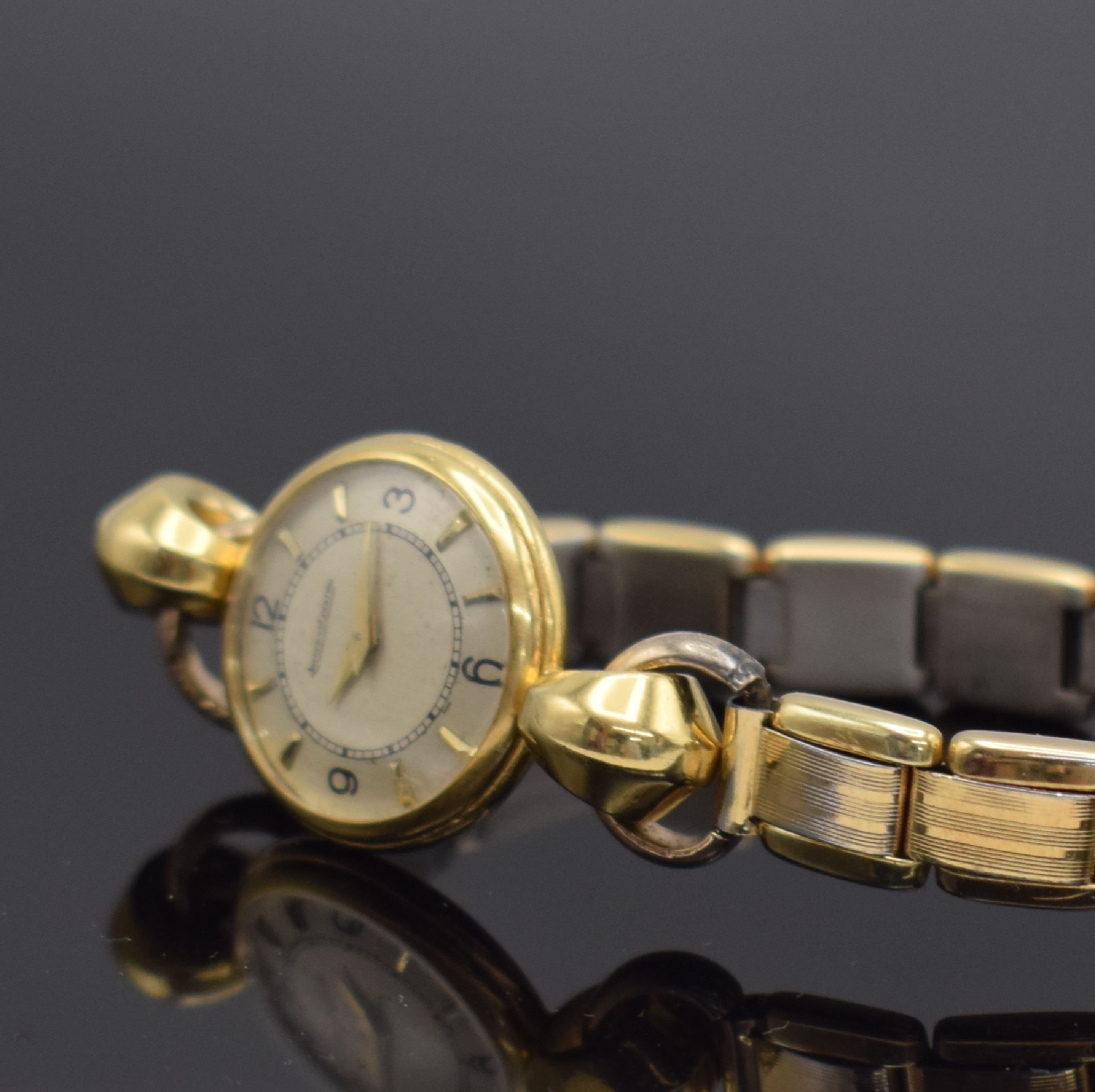 Detail b: Jaeger-LeCoultre Damenarmbanduhr in GG 750/000, Schweiz um 1940, Handaufzug sog. Backwinder, 2-teil. Geh., Boden 2-fach verschr., neutr. verg. Band ...