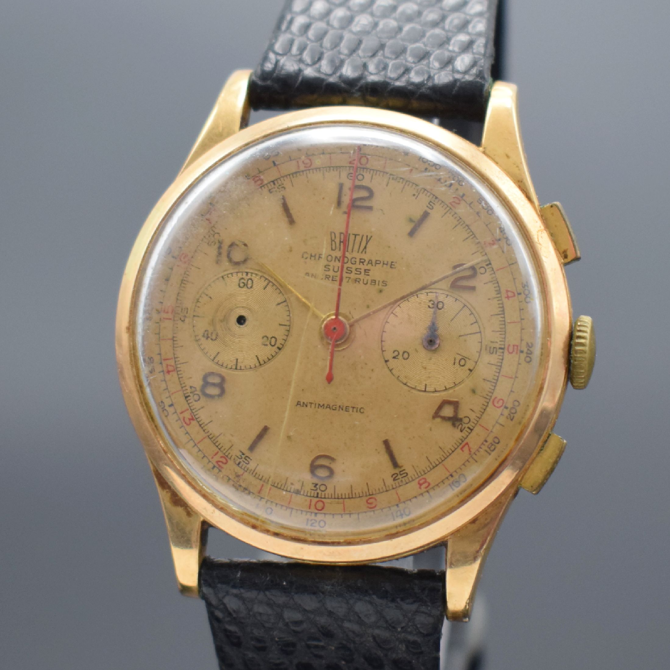 Detail a: BRITIX Herrenarmbanduhr mit Chronograph in GG 750/000, Schweiz um 1950, Handaufzug, Geh. dell., Boden & Glasrand aufgedr., Zifferbl. m. arab. Zahlen ...