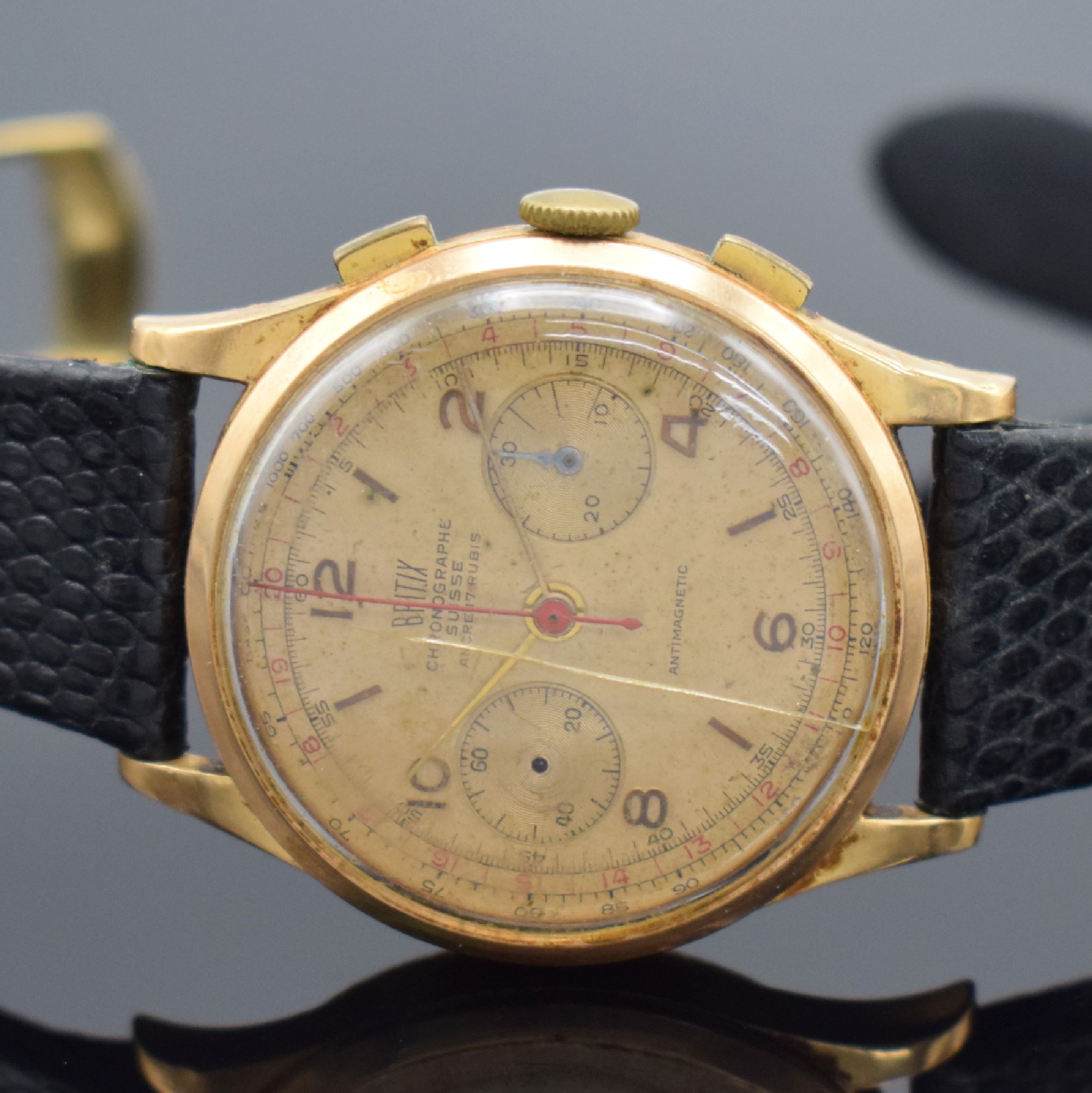 Detail b: BRITIX Herrenarmbanduhr mit Chronograph in GG 750/000, Schweiz um 1950, Handaufzug, Geh. dell., Boden & Glasrand aufgedr., Zifferbl. m. arab. Zahlen ...