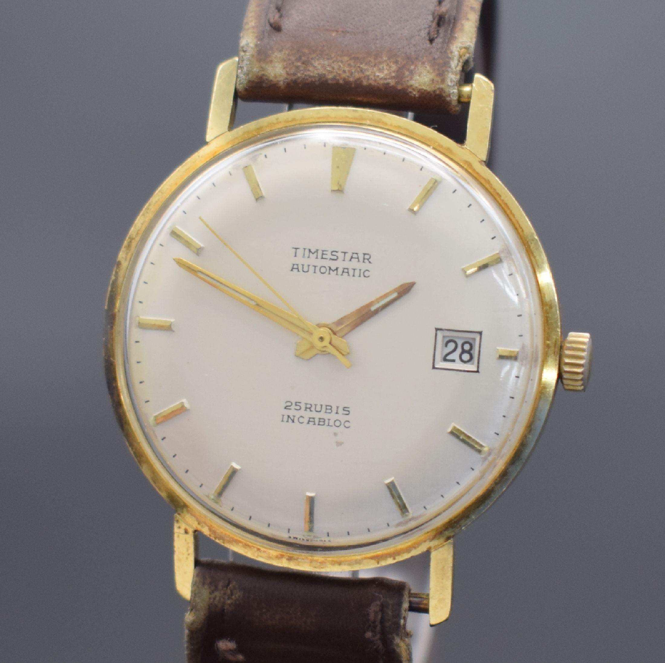 Detail a: TIMESTAR Herrenarmbanduhr in GG 585/000, Schweiz um 1965, Automatik, 2-teil. Gehäuse, Boden aufgedr., silb. Zifferbl. m. aufges. Std.-Ind., gold. ...