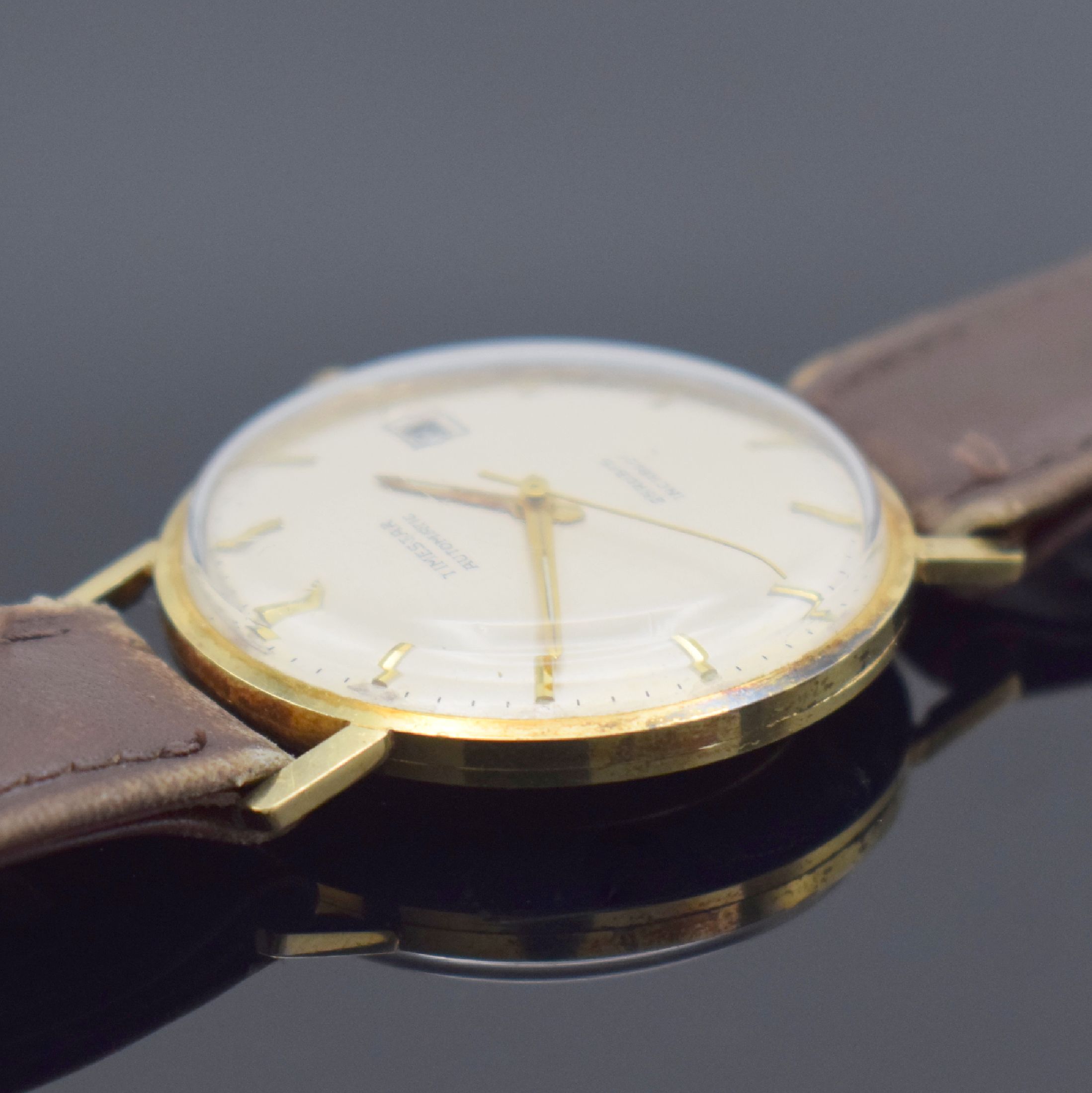 Detail b: TIMESTAR Herrenarmbanduhr in GG 585/000, Schweiz um 1965, Automatik, 2-teil. Gehäuse, Boden aufgedr., silb. Zifferbl. m. aufges. Std.-Ind., gold. ...