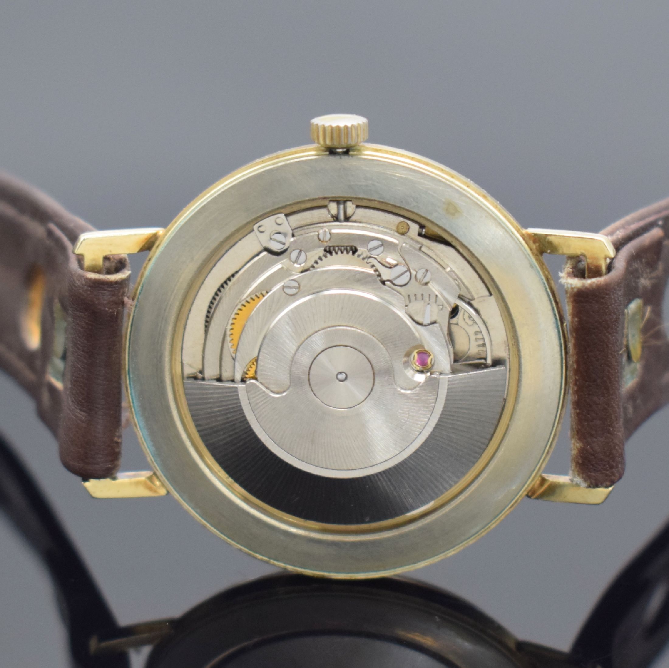 Detail d: TIMESTAR Herrenarmbanduhr in GG 585/000, Schweiz um 1965, Automatik, 2-teil. Gehäuse, Boden aufgedr., silb. Zifferbl. m. aufges. Std.-Ind., gold. ...