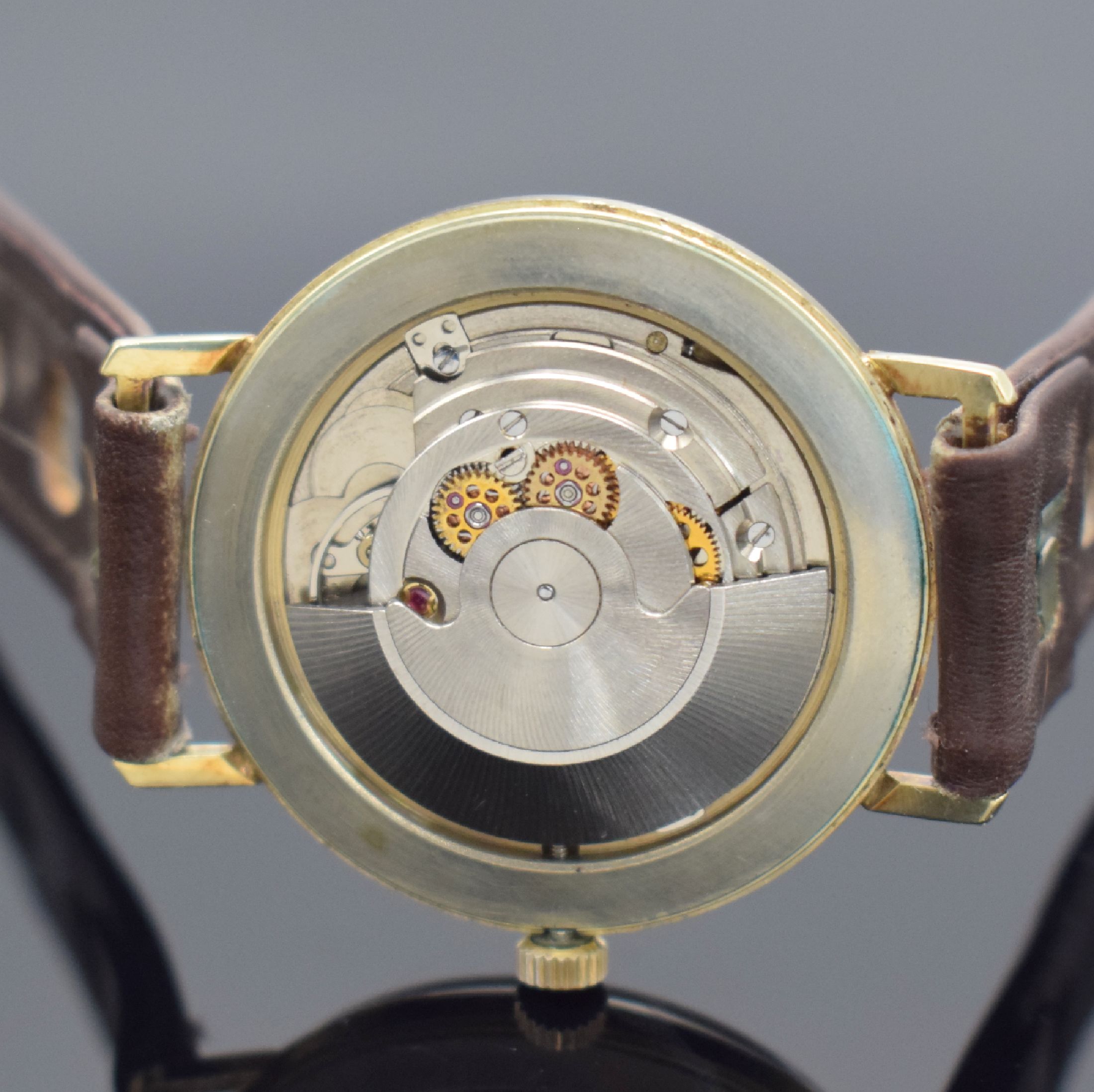 Detail e: TIMESTAR Herrenarmbanduhr in GG 585/000, Schweiz um 1965, Automatik, 2-teil. Gehäuse, Boden aufgedr., silb. Zifferbl. m. aufges. Std.-Ind., gold. ...
