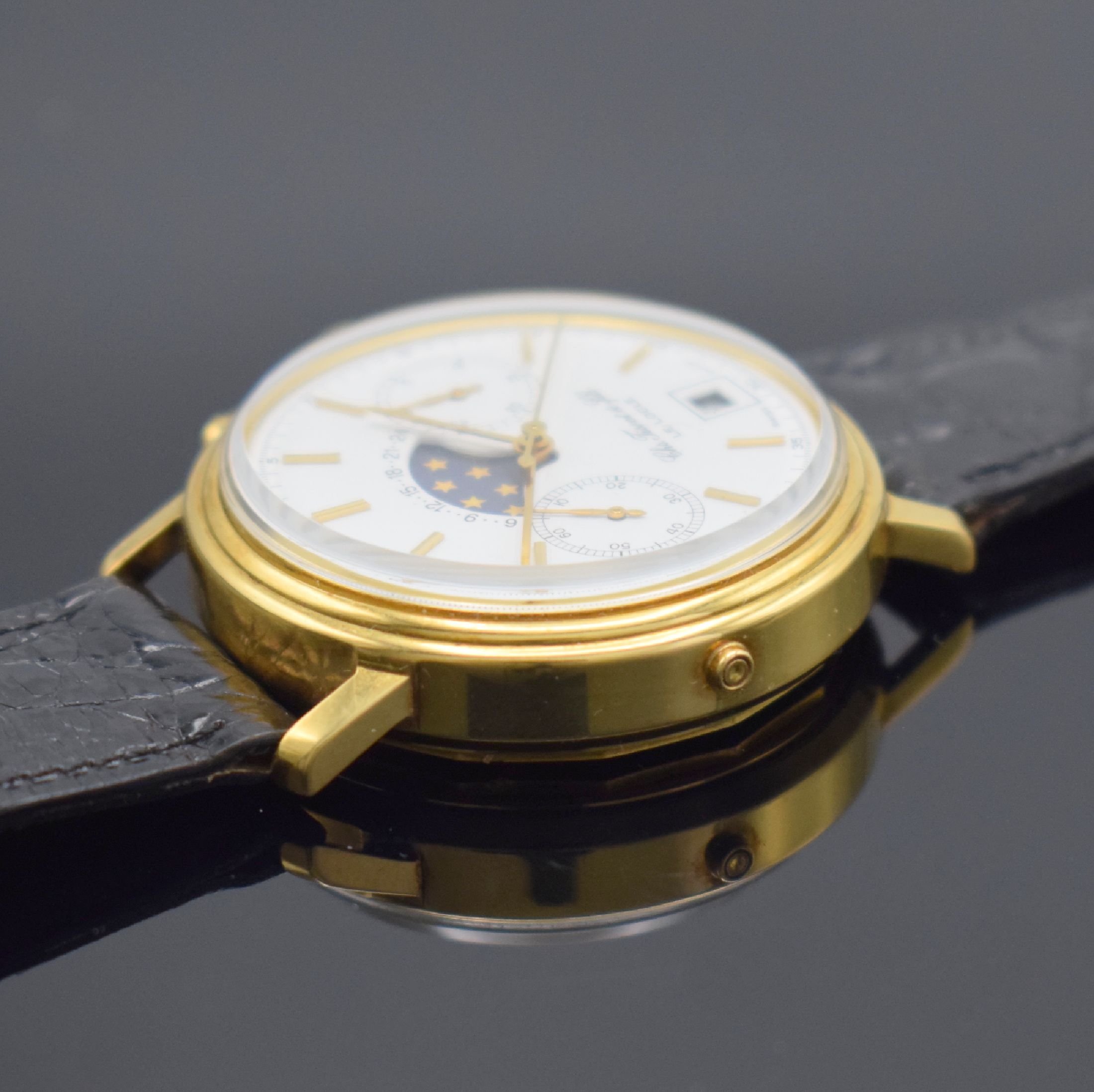 Detail d: TISSOT Le Locle Herrenchronograph mit Mondphase in GG 750/000, Schweiz um 1980, Handaufzug, Boden verschr., Korrekturdr. seitl. im Geh. b. 9, orig. ...