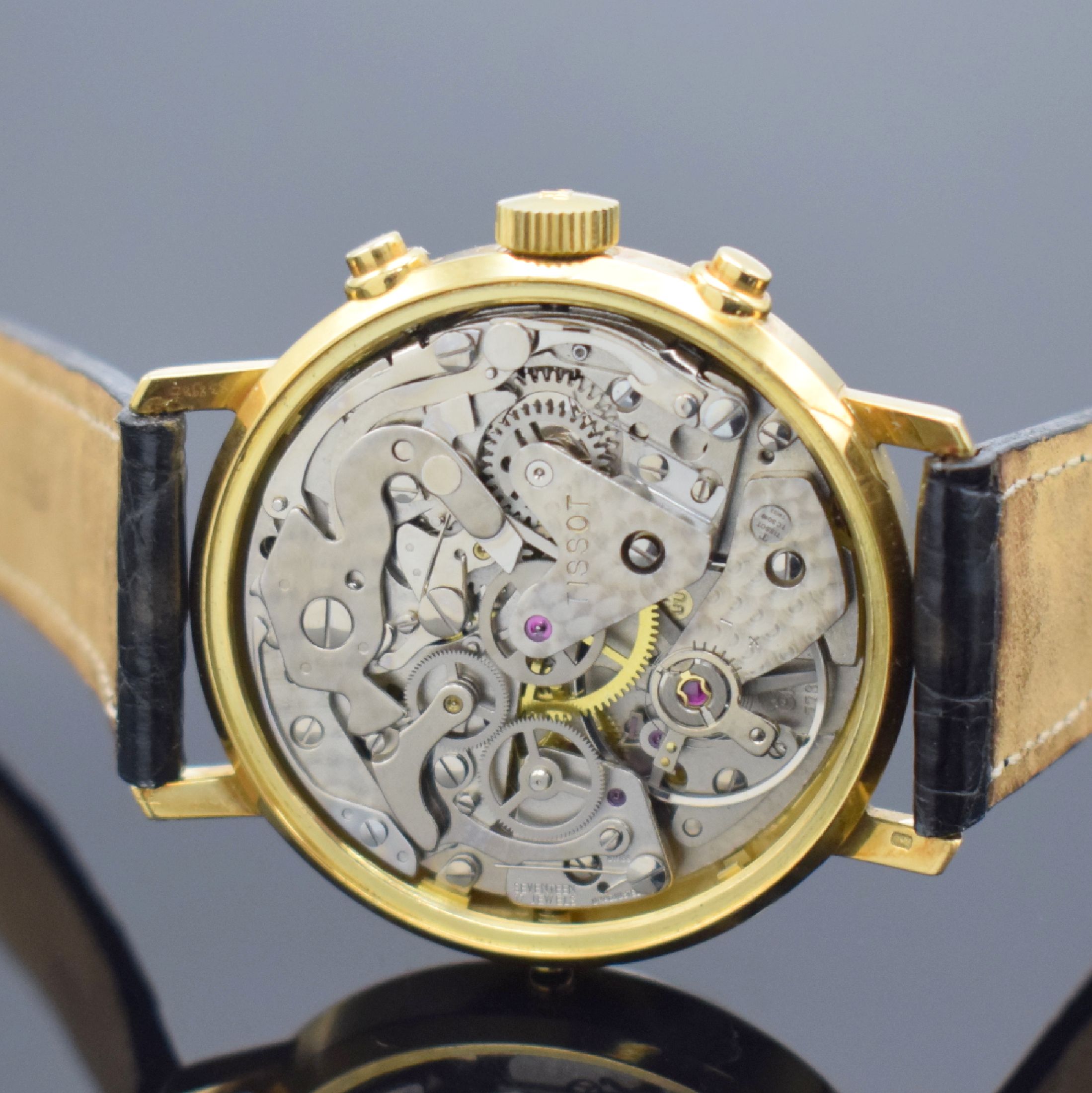 Detail e: TISSOT Le Locle Herrenchronograph mit Mondphase in GG 750/000, Schweiz um 1980, Handaufzug, Boden verschr., Korrekturdr. seitl. im Geh. b. 9, orig. ...