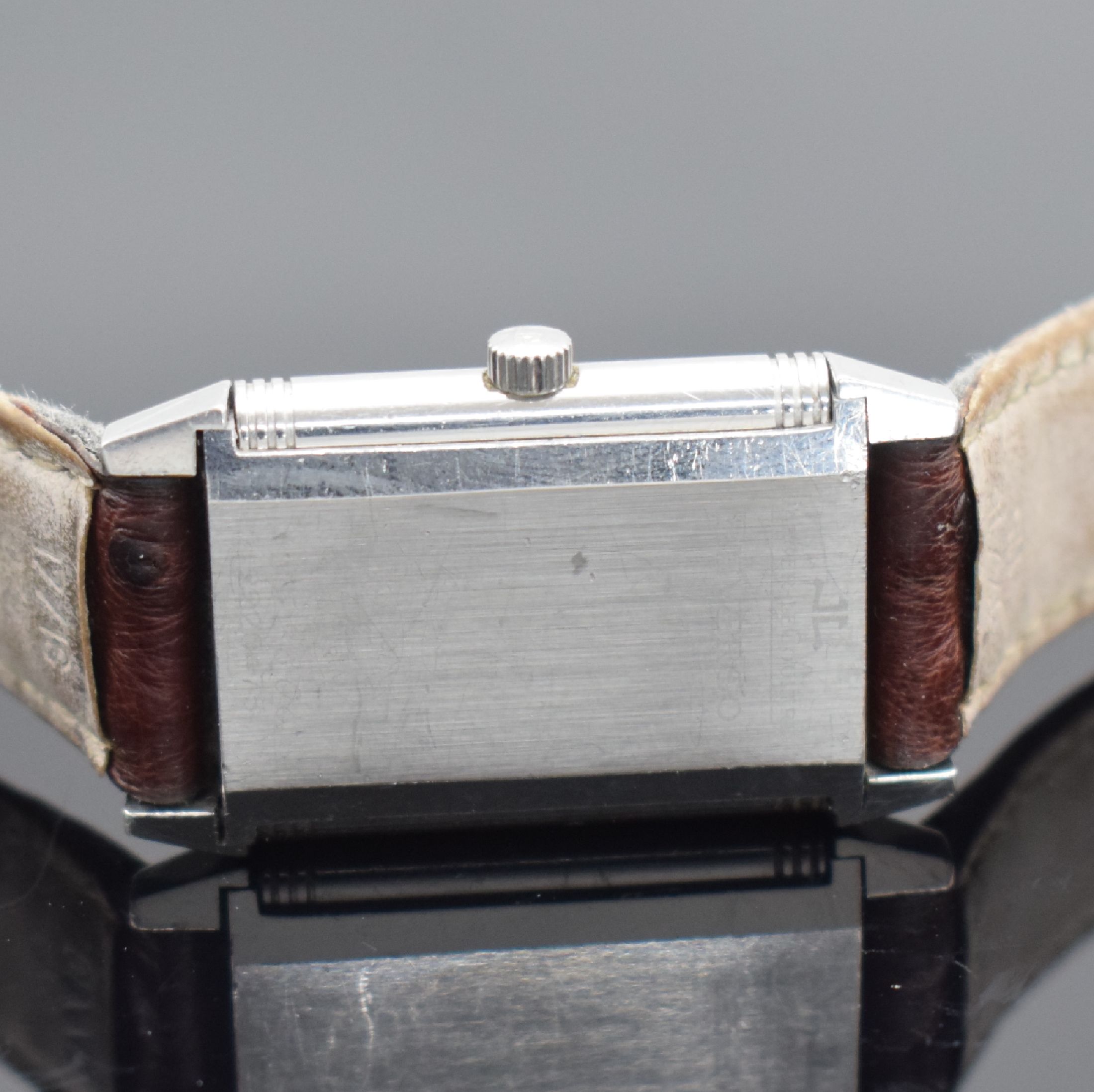 Detail e: Jaeger-LeCoultre Reverso Armbanduhr in Stahl, Schweiz um 2000, quarz, Ref. 252.8.08, um 180 Grad drehb. Wendegeh., neutr. Lederband m. orig. ...
