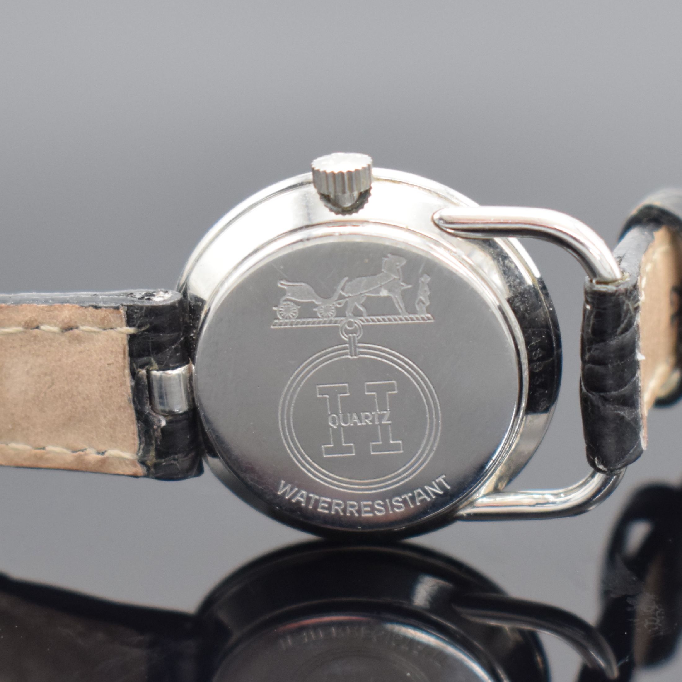 Detail b: HERMES Paris Damenarmbanduhr in Stahl, Schweiz um 2000, quarz, Boden aufgedr., ausgefallene Bandanstöße, weißes Zifferbl. m. arab. Zahlen, geschw. ...