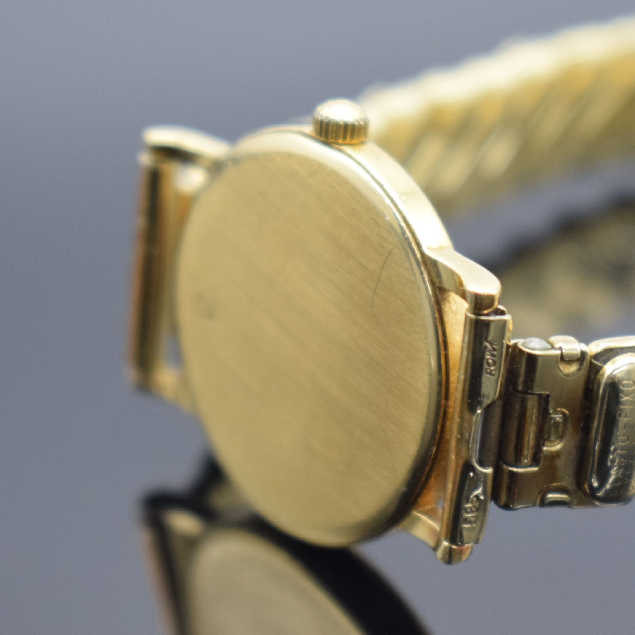 Detail c: OMEGA De Ville Damenarmbanduhr in GG 750/000, Schweiz verk. lt. beil. Garantiekarte 08/1994, quarz, Boden aufgedr., neutr. Flexband in GG 585/000, ...