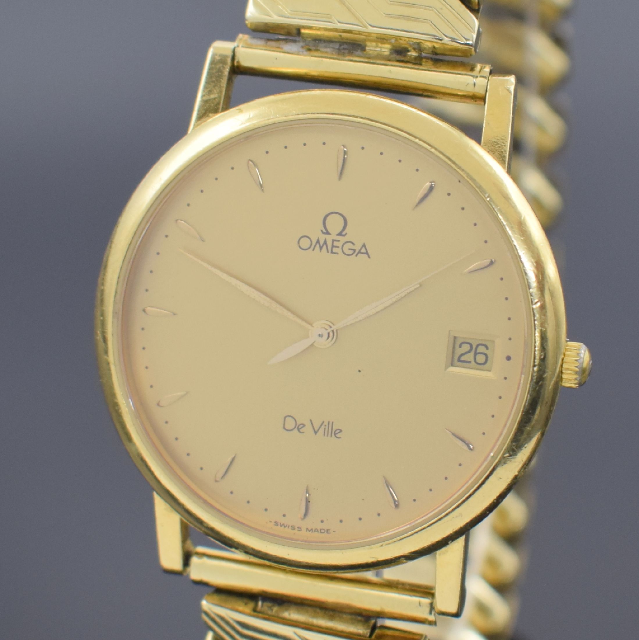 Detail a: OMEGA De Ville Herrenarmbanduhr in GG 750/000, Schweiz verk. lt. beil. Garantiekarte 04/1994, quarz, Boden aufgedr., neutr. Flexband in GG 585/000, ...