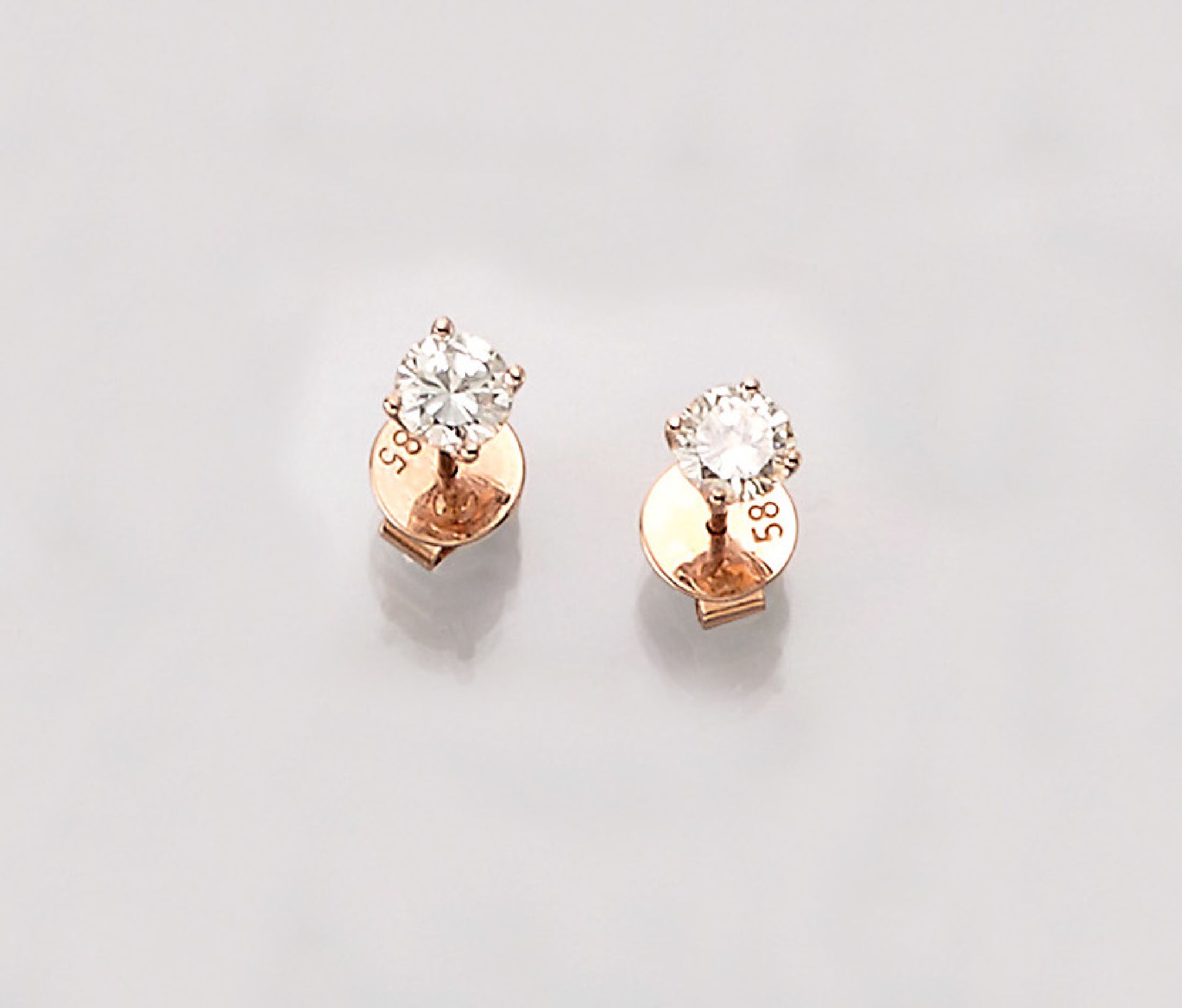 Paar 14 kt Gold Brillant-Ohrstecker, RG 585/000, 2 Brillanten zus. ca. 1.09 ct Weiß- l.get.Weiß/vs-si