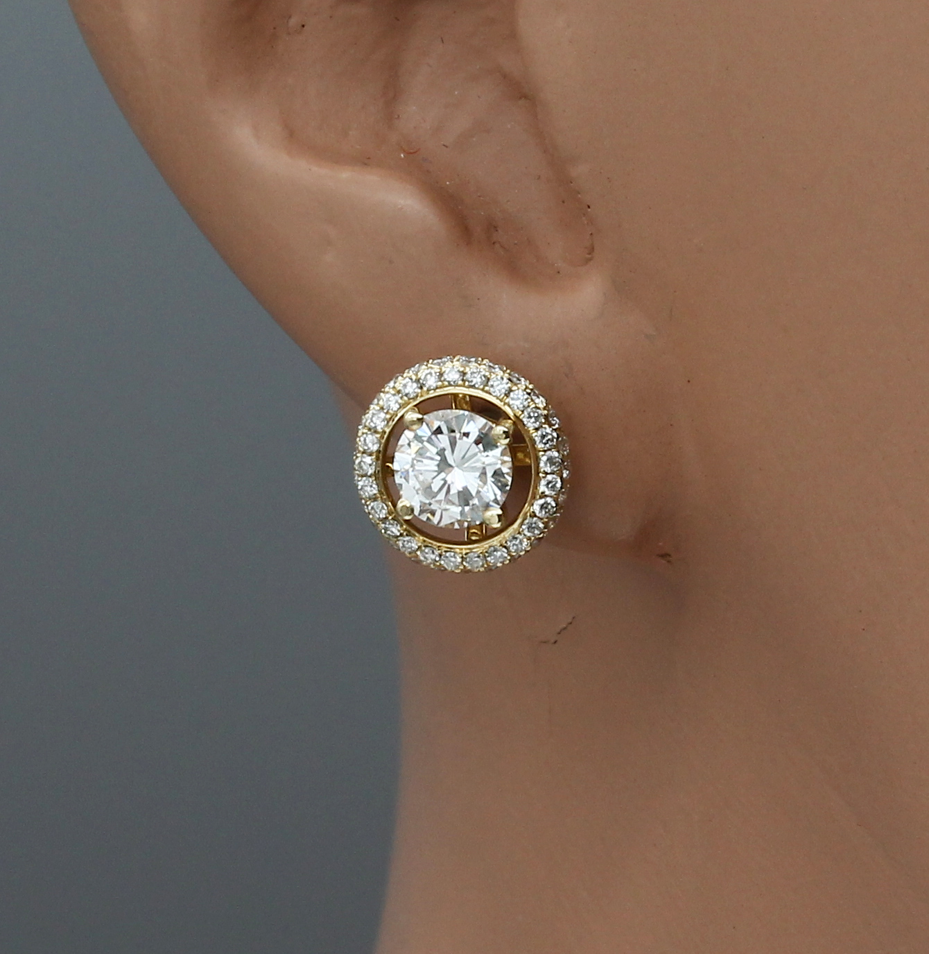 Detail a: Paar 18 kt Gold Brillant-Ohrstecker, GG 750/000, 2 Brillanten zus. ca. 1.0 ct Weiß/vs,mit 2 abnehmbaren Ringen mit total ca. 102 Brillanten zus. ...