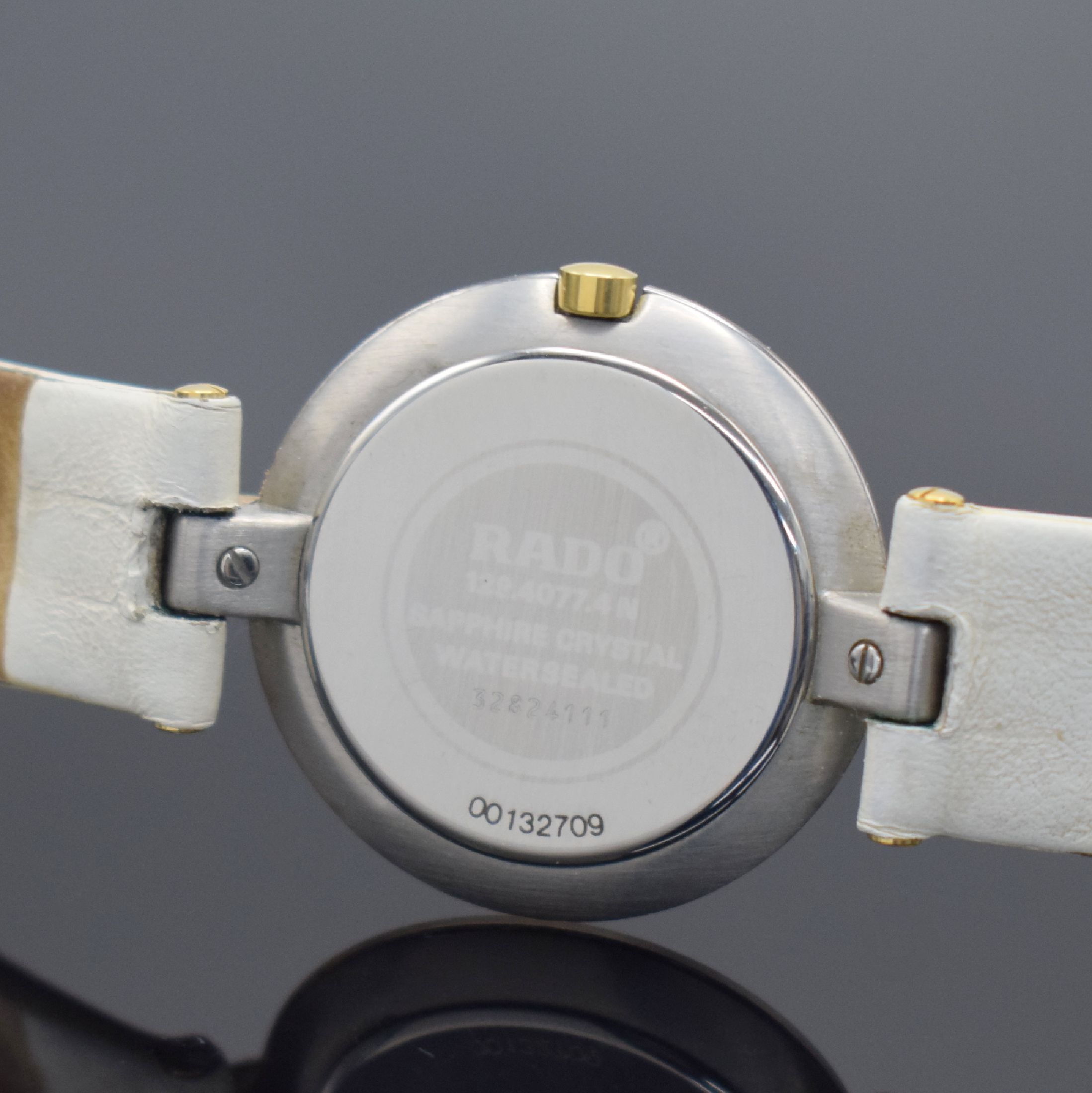 Detail c: RADO Damenarmbanduhr Coupole in Stahl vergoldet, Schweiz um 2005, quarz, Ref. 129.4077.4N, Boden aufgedr., Saphirglas, orig. Lederband m. verg. ...