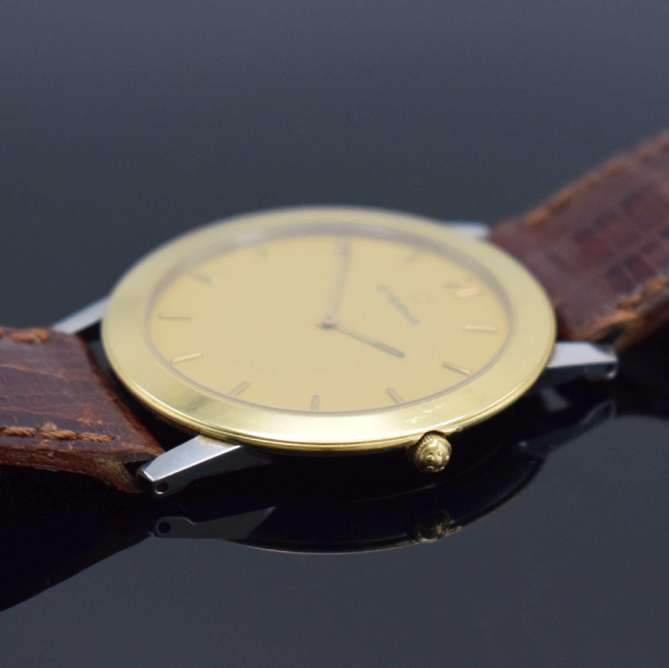 Detail c: ETERNA flache & elegante Herrenarmbanduhr in Stahl/Gold, Schweiz lt. orig. Papier verk. 1996, quarz, gedr. Geh., Ref. 140 3000 47S, Goldlünette m. ...