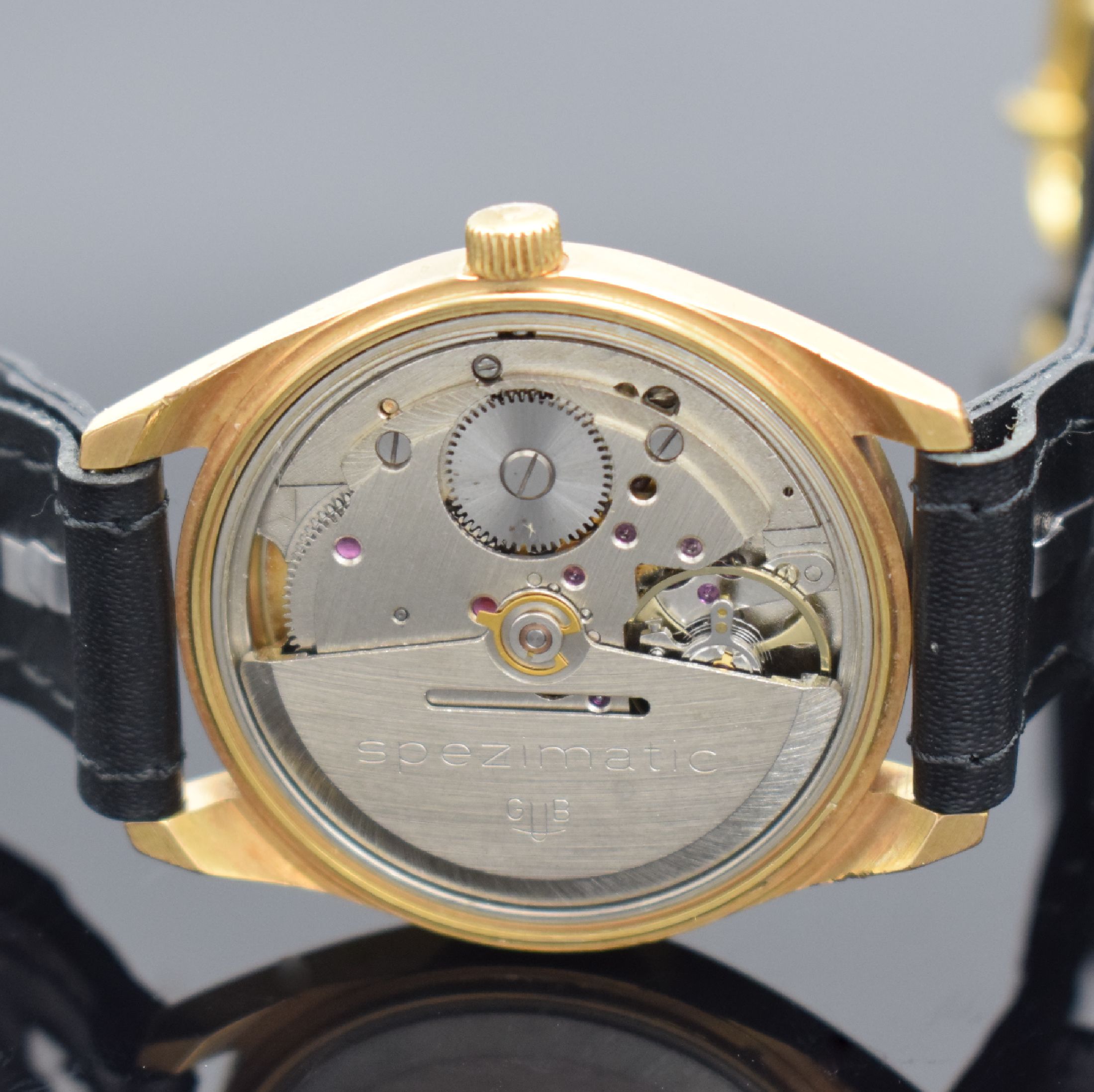 Detail d: GLASHÜTTE Spezimatic vergoldete Armbanduhr, DDR um 1975, Automatik, 2-tlg. Geh., gedr. Stahlboden, silb. Zifferbl., Leuchtindizes & -zeiger ...