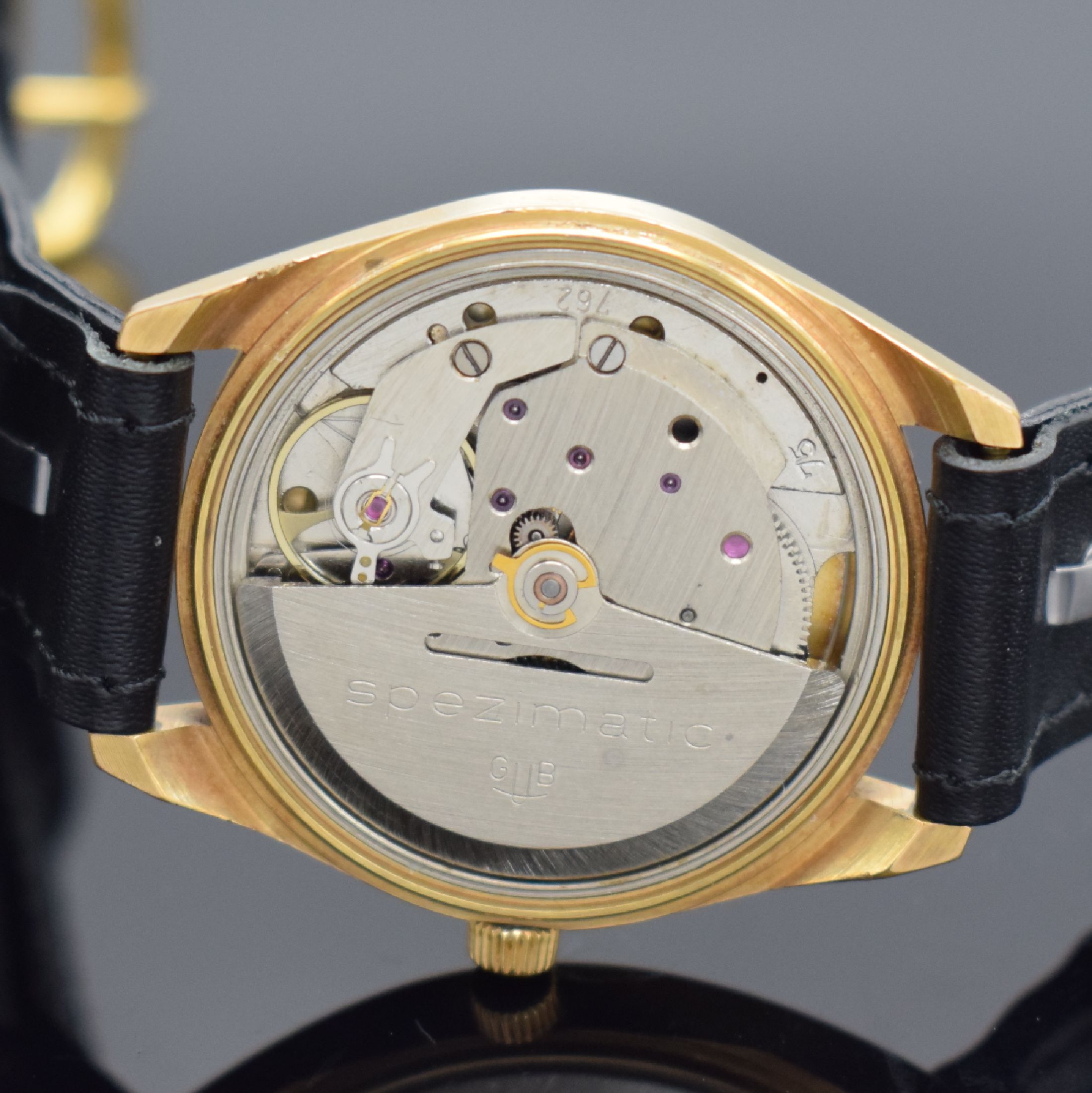 Detail e: GLASHÜTTE Spezimatic vergoldete Armbanduhr, DDR um 1975, Automatik, 2-tlg. Geh., gedr. Stahlboden, silb. Zifferbl., Leuchtindizes & -zeiger ...
