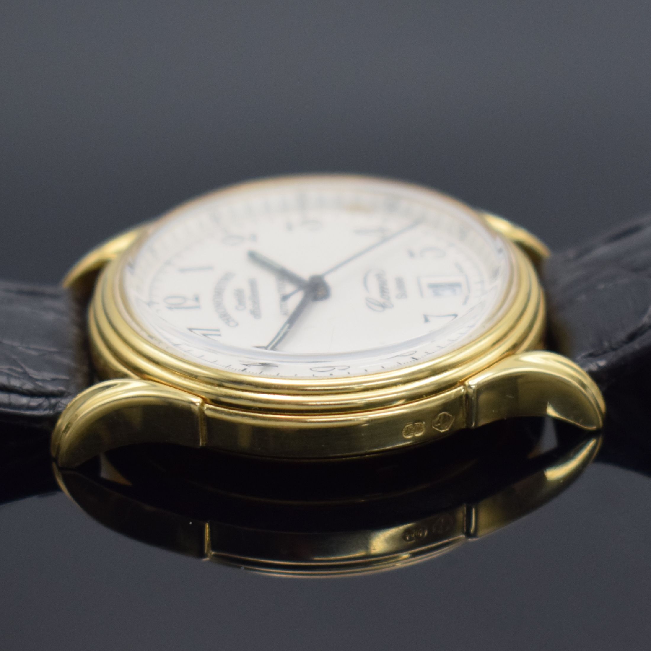 Detail b: COMOR Chronometre limitierte Herrenarmbanduhr in GG 750/000, Schweiz lt. orig. Papier verk. 1997, Automatik, beids. vergl. Geh., Boden verschr., ...