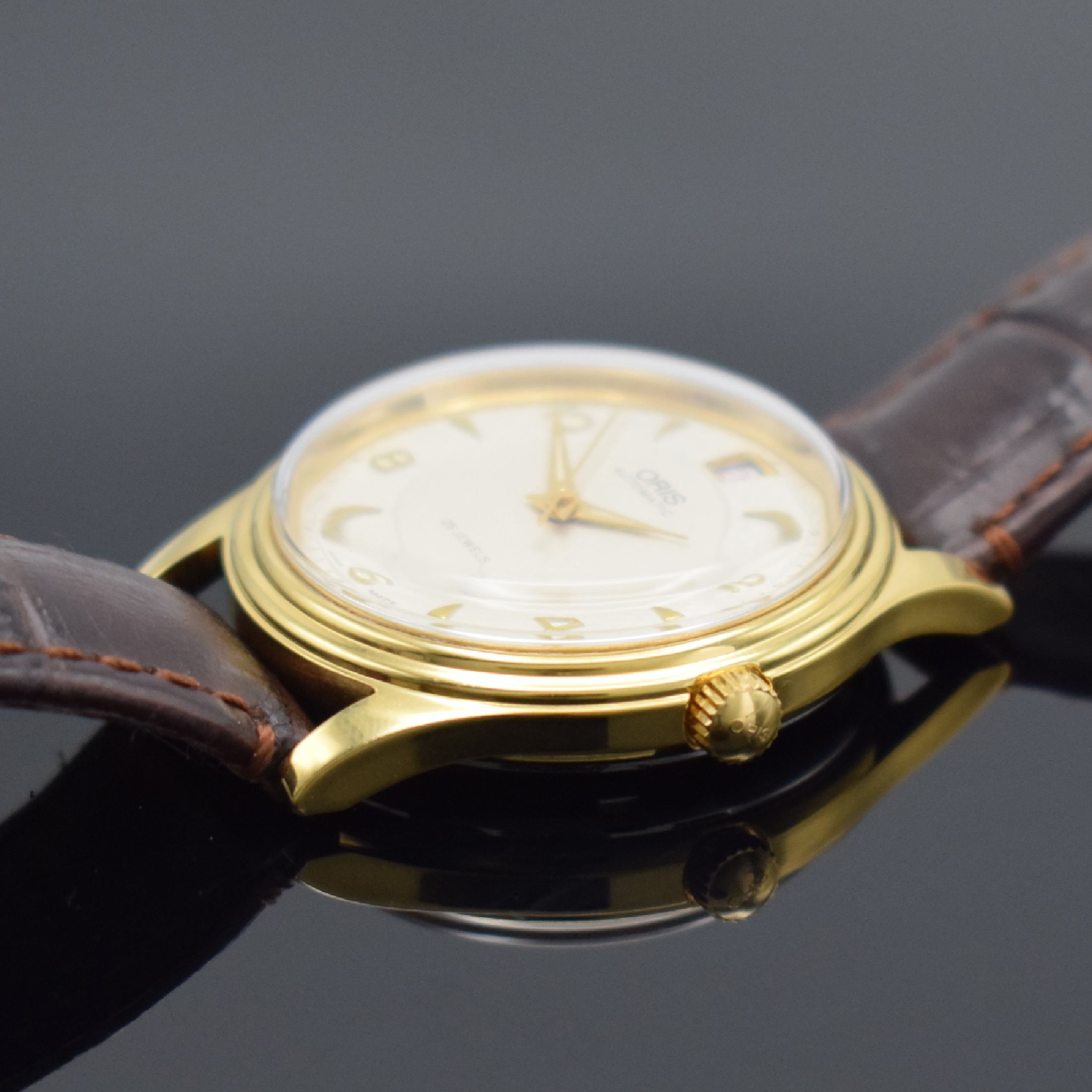 Detail c: ORIS Armbanduhr in Stahl/vergoldet, Schweiz um 1995, Automatik, beids. vergl. Geh., Boden verschr., orig. Lederband m. verg. Stiftschl., silb. ...
