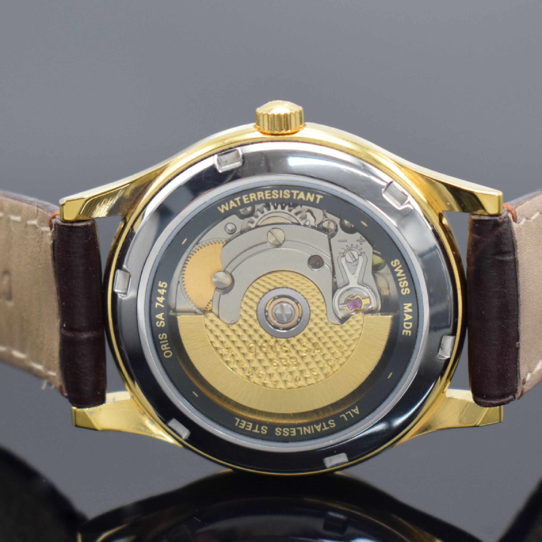 Detail d: ORIS Armbanduhr in Stahl/vergoldet, Schweiz um 1995, Automatik, beids. vergl. Geh., Boden verschr., orig. Lederband m. verg. Stiftschl., silb. ...