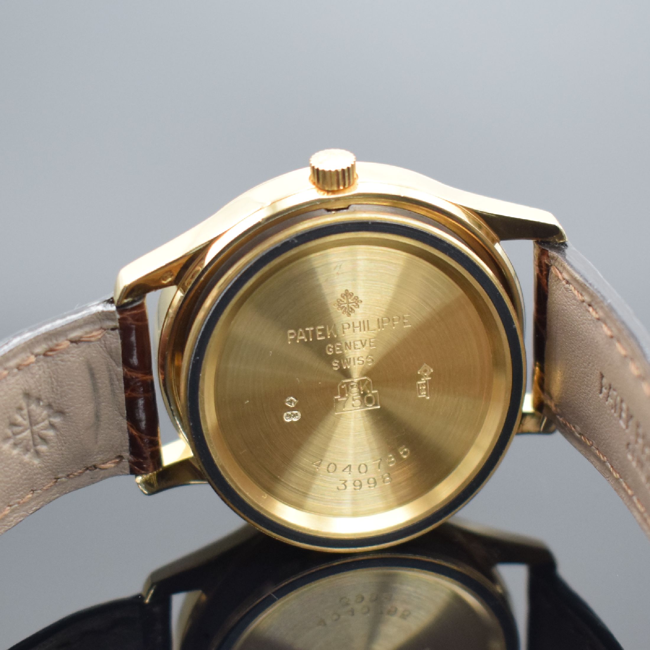 Detail g: PATEK PHILIPPE Calatrava Ref. 3998J in GG 750/000, Schweiz lt. orig. Zertifikat verk. 1999, Automatik, 2-tlg. Geh., Boden verschr., orig. Lederband ...
