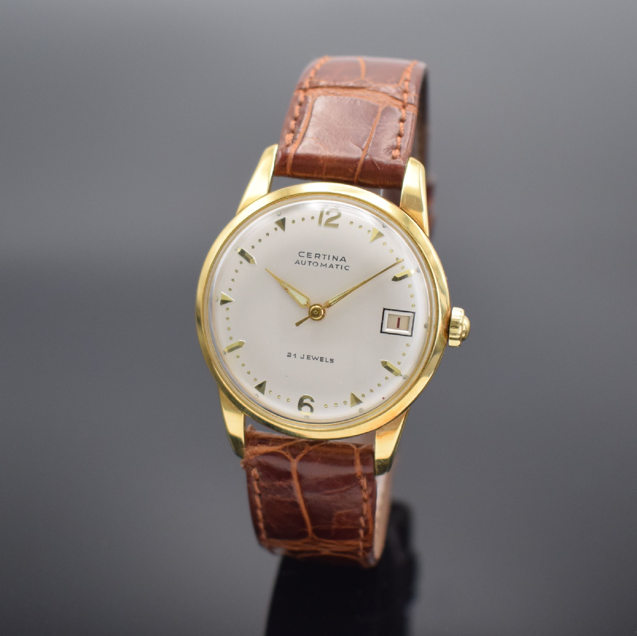 CERTINA Herrenarmbanduhr in GG 750/000 mit original Papier & Rechnung, Schweiz verk. 1955, Automatik, gedr. Geh., silb. Zifferbl. m. gold. Indizes ...