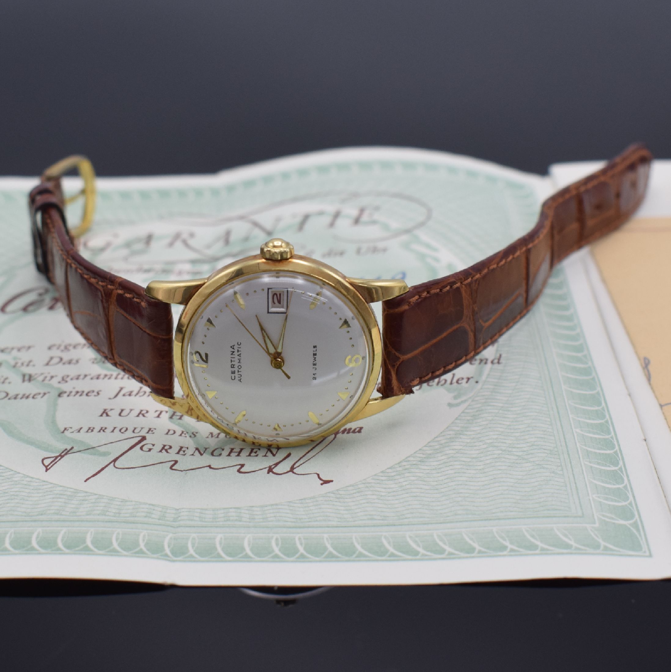 Detail h: CERTINA Herrenarmbanduhr in GG 750/000 mit original Papier & Rechnung, Schweiz verk. 1955, Automatik, gedr. Geh., silb. Zifferbl. m. gold. Indizes ...